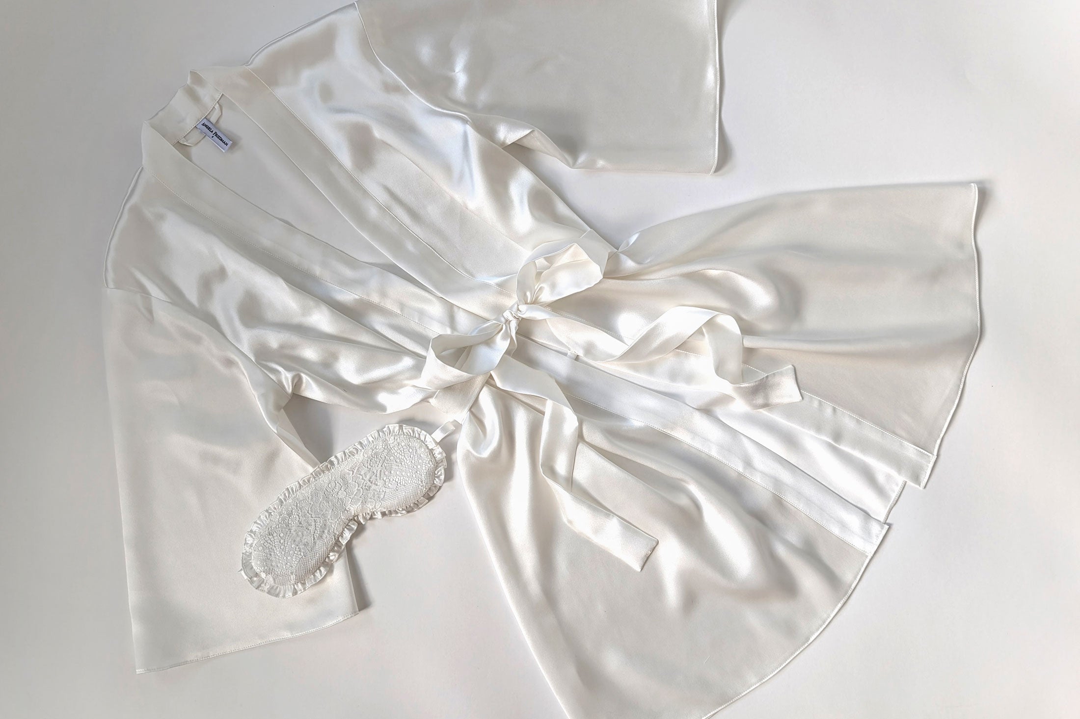 White silk dressing gown and robes for brides on their wedding day