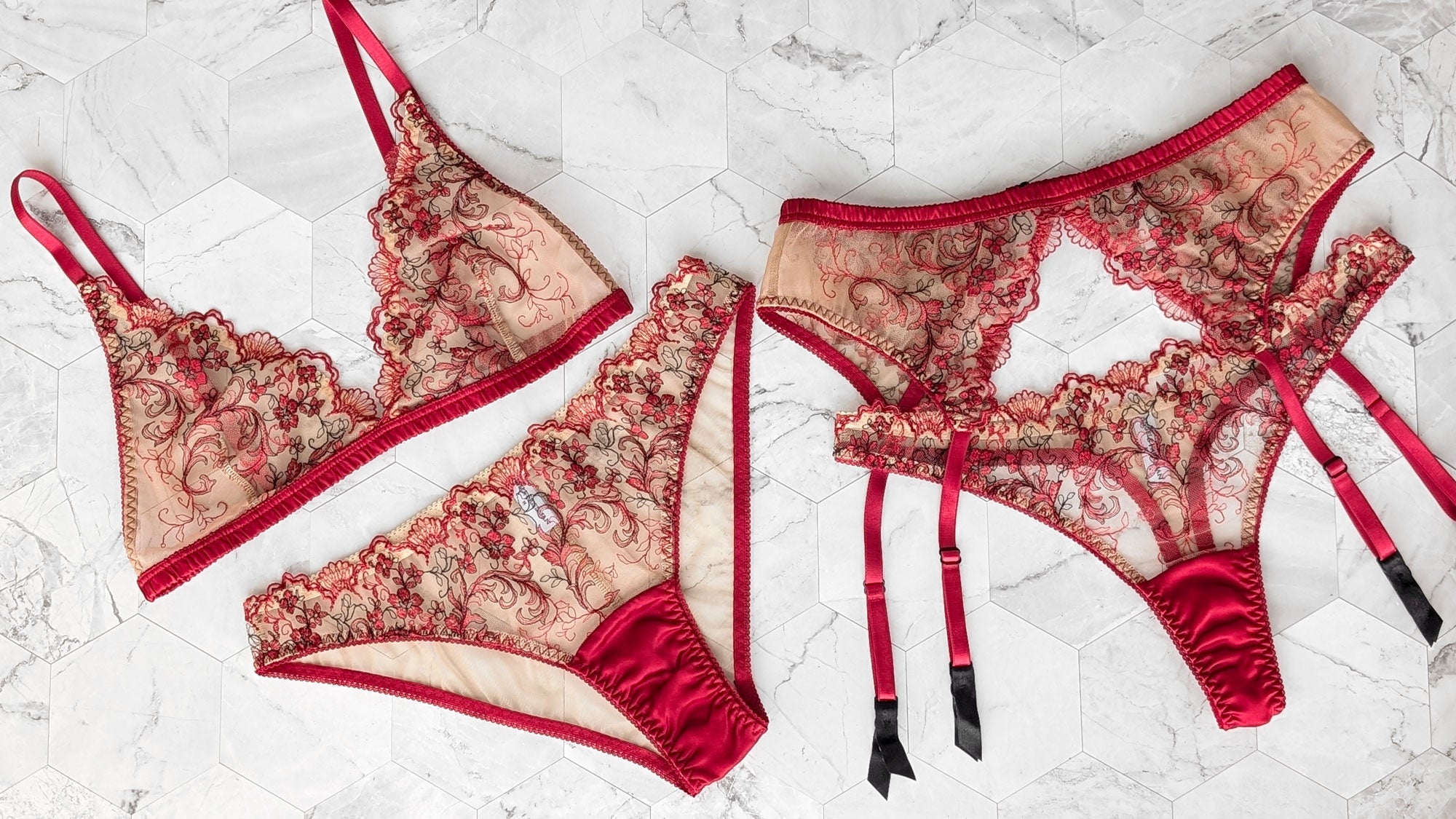 Red mesh lingerie sets with sheer embroidery and silk trimmings for Christmas gift giving