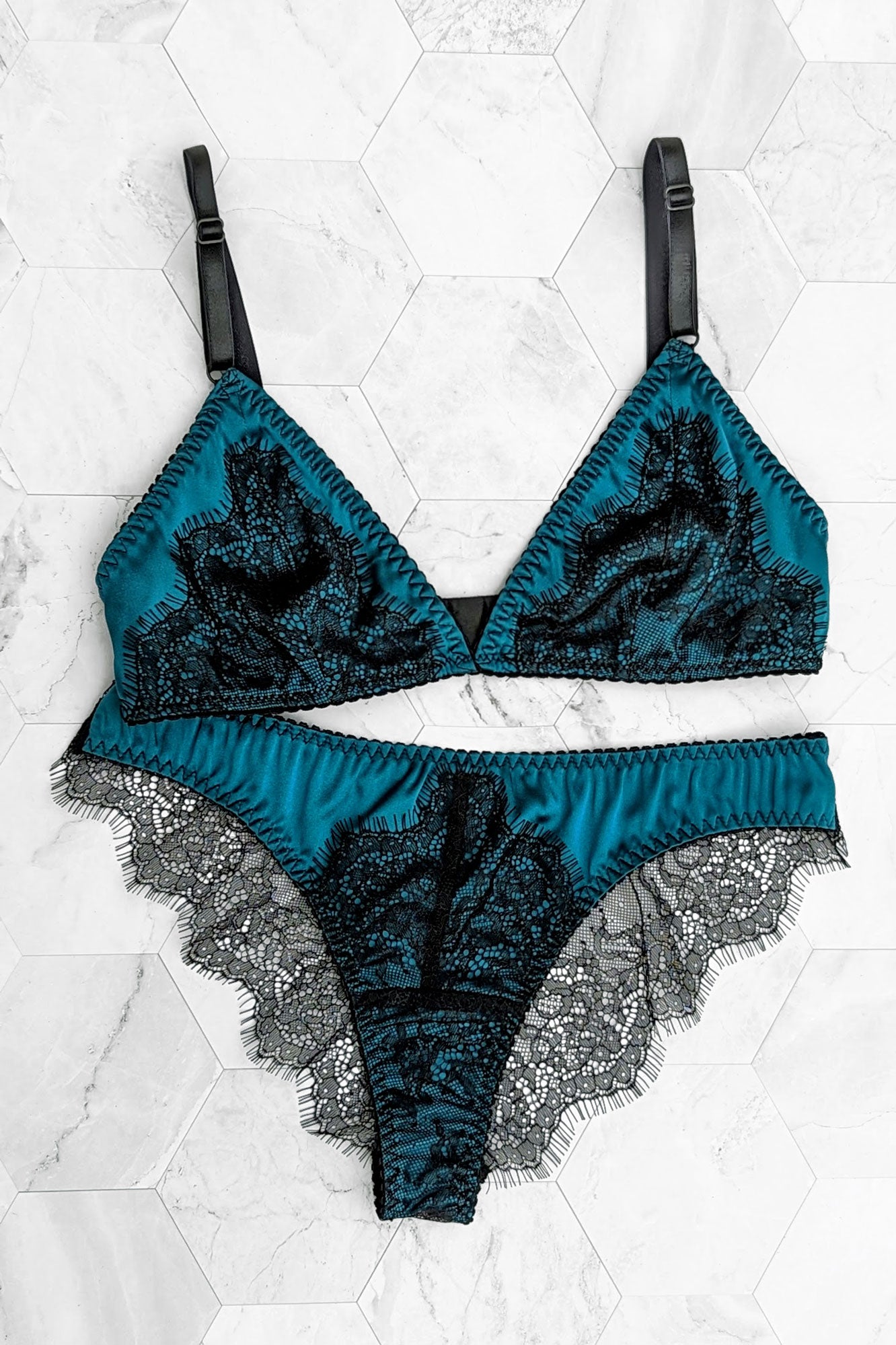 Designer lace lingerie set with a silk bra and cheeky panties