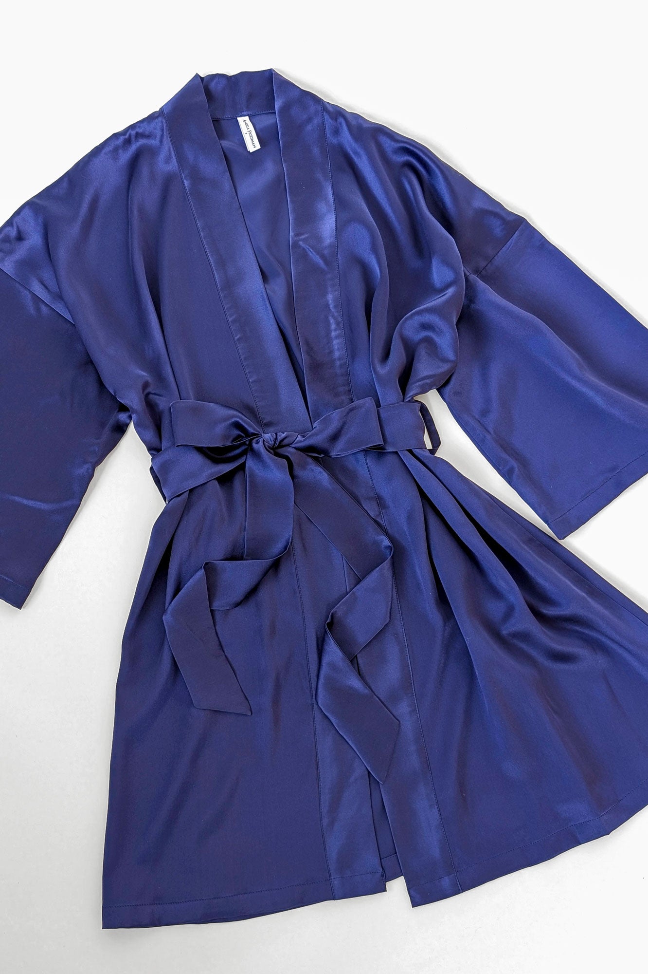 Blue silk robe with kimono style neckline and an indigo sash belt