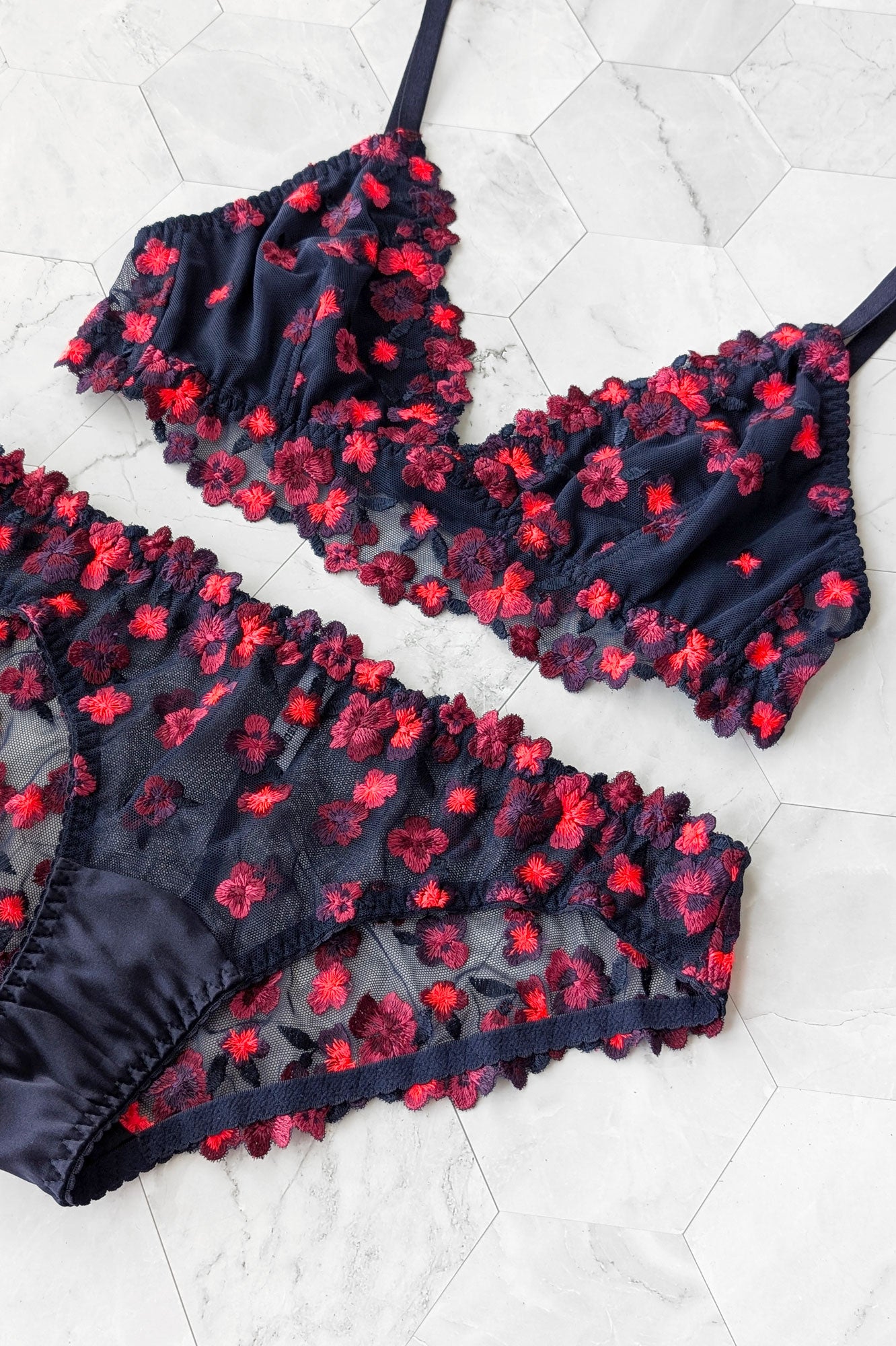 Navy blue and coral red lingerie set with bikini panties and a wireless longline bralette