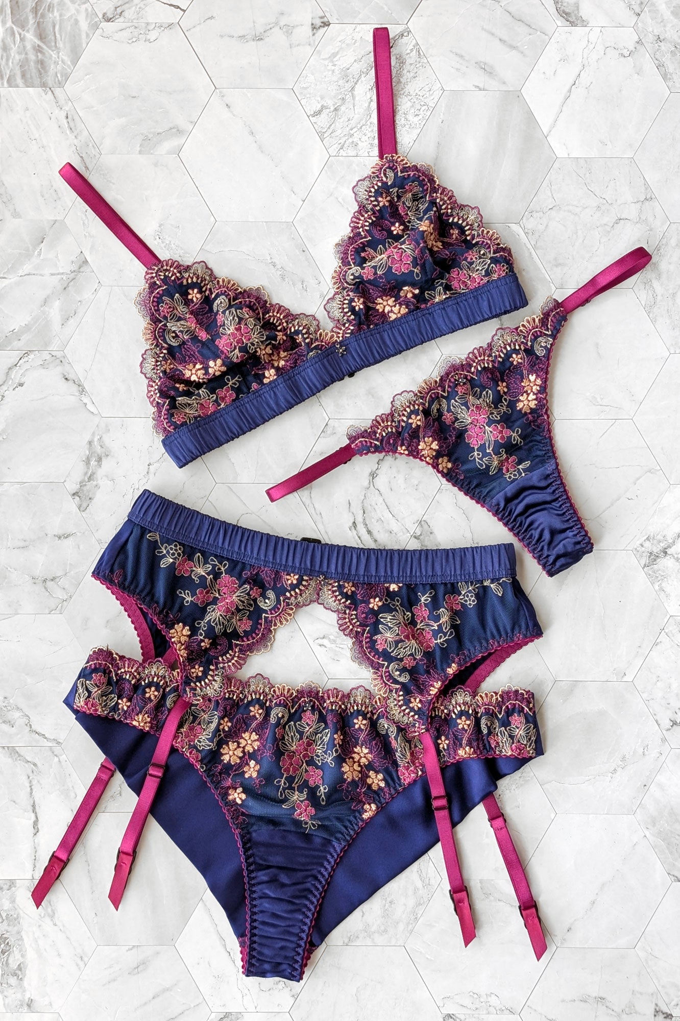 Vintage inspired lingerie set in navy and fuchsia with floral embroidered overlays and real stretch satin linings