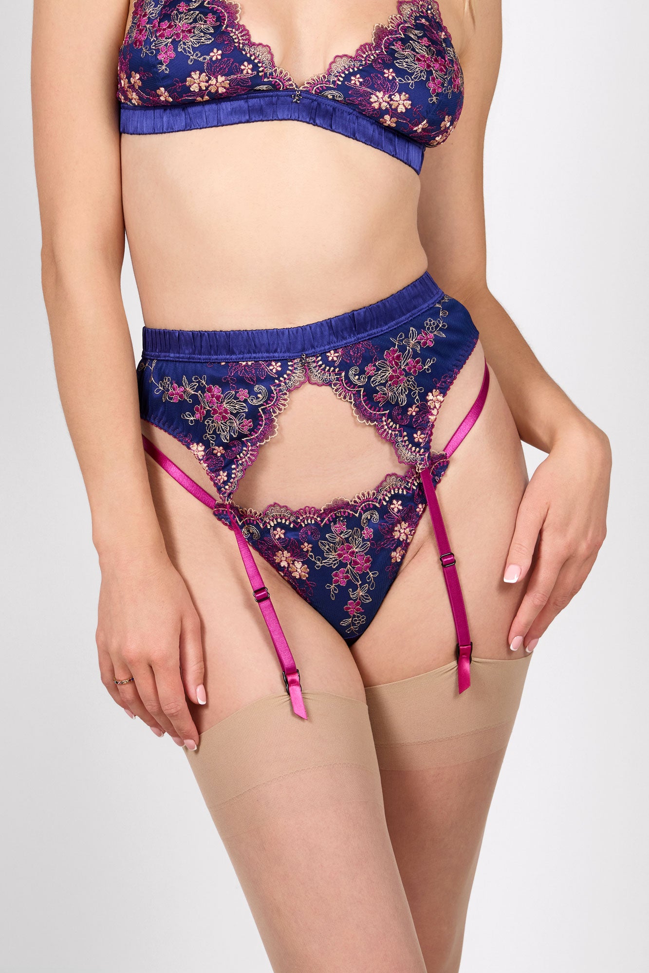 Marina navy blue lingerie set with a floral trimmed thong panty and vintage style garter belt