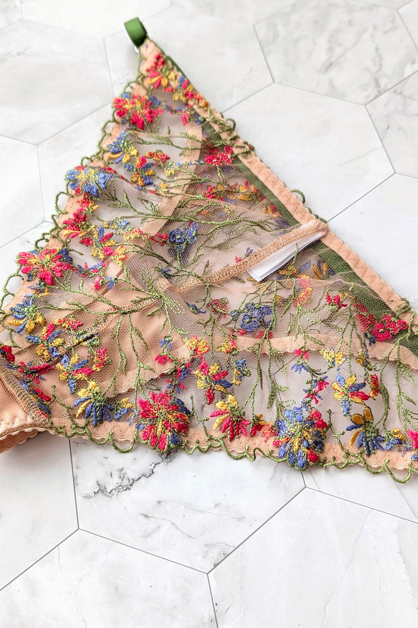 Embroidered flower underwear with scalloped lace edges and a transparent nude tulle back