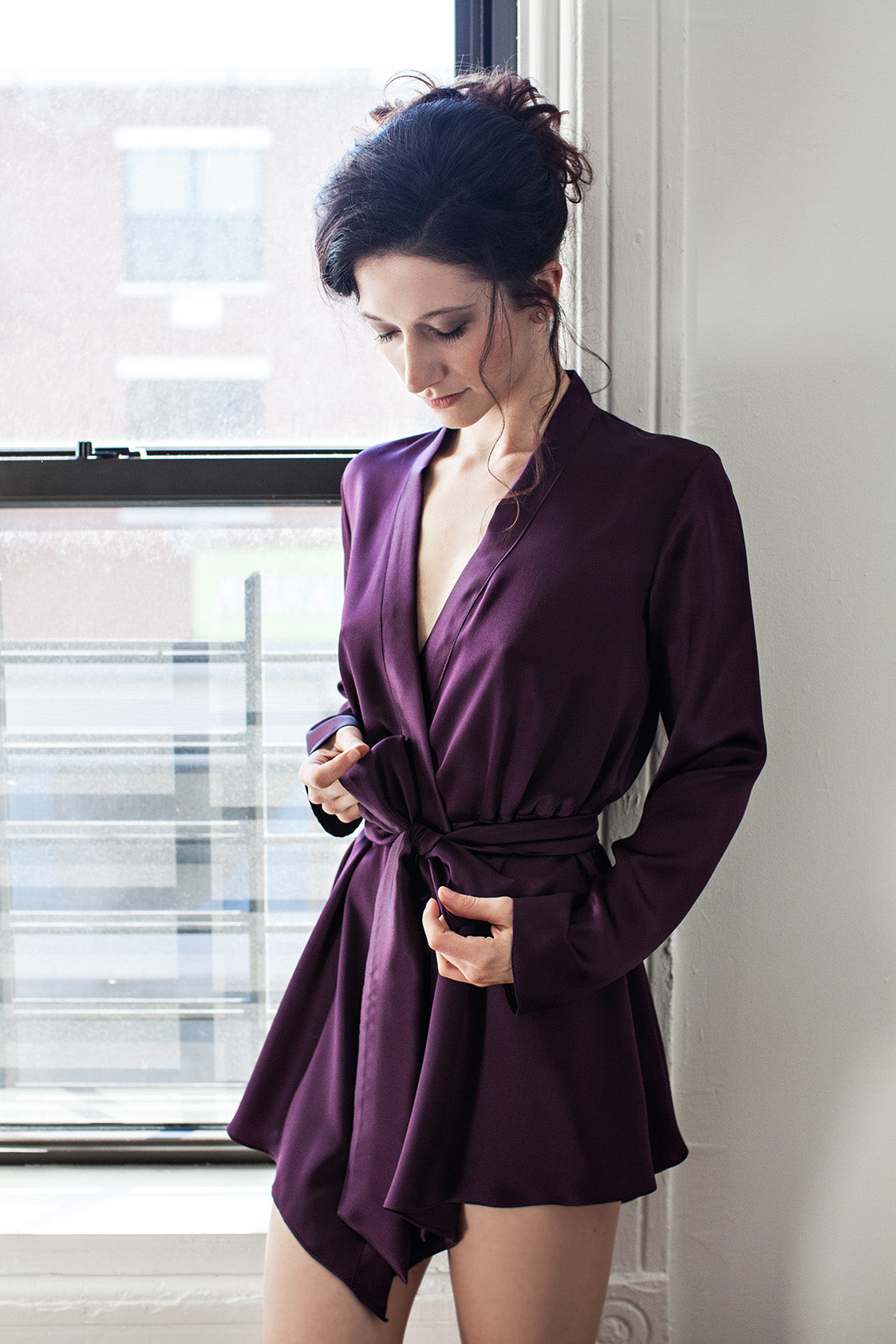 Purple silk kimono robe with a wide satin sash belt and handkerchief hem
