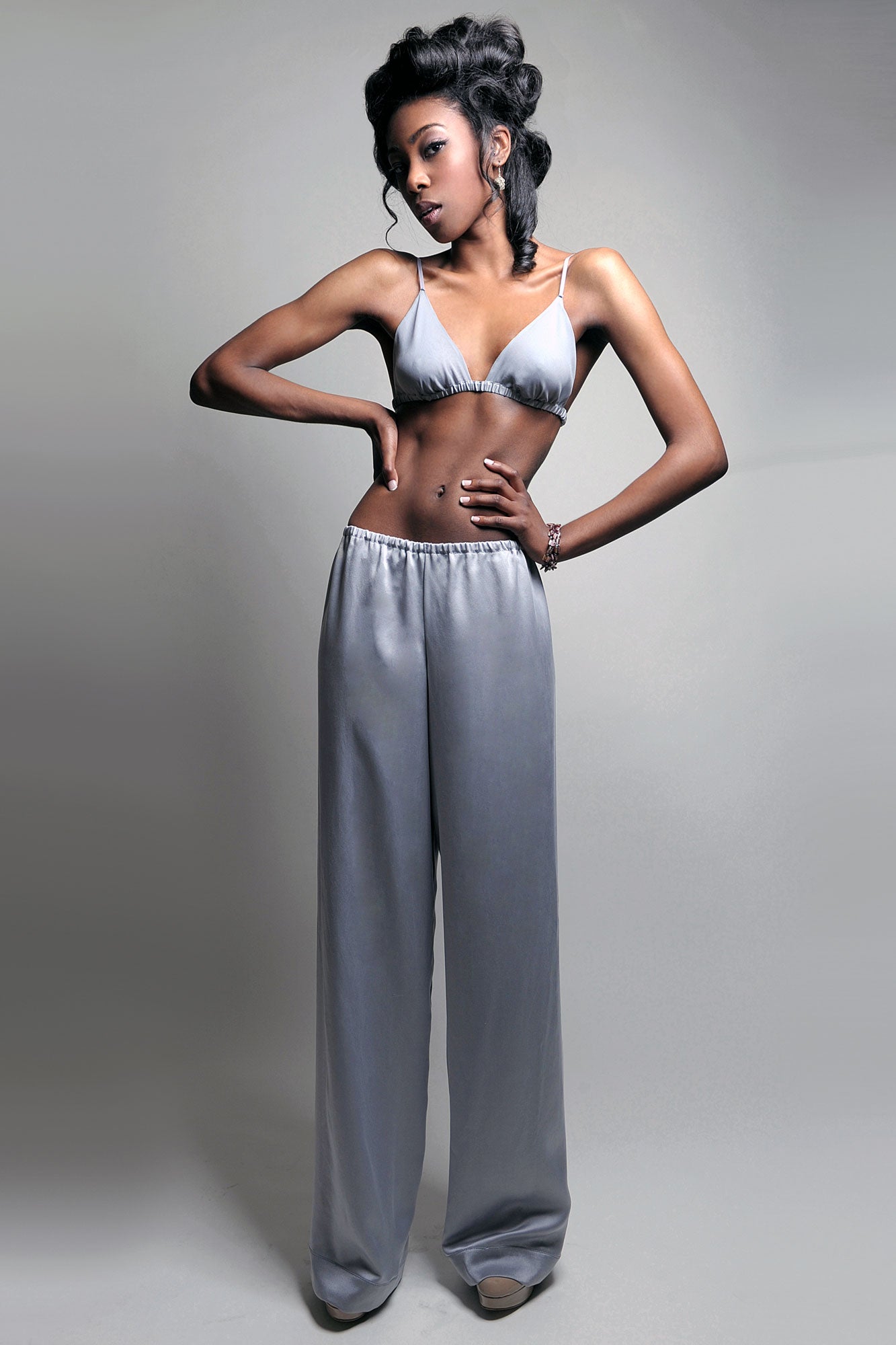 Designer loungewear set with a triangle bra and silk pajama pants in grey satin