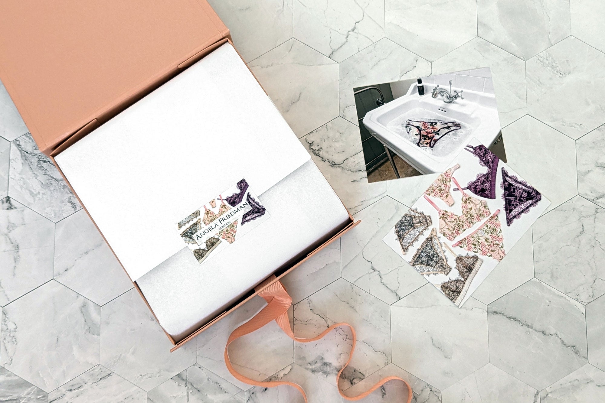 Open gift box for Angela Friedman lingerie