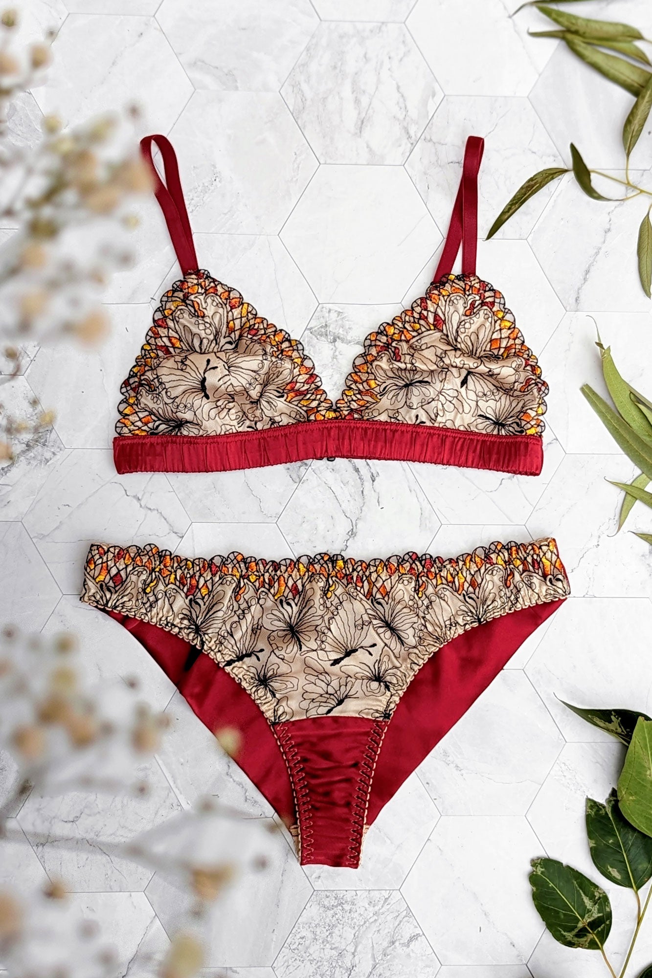 Red silk lingerie set with butterfly pattern knickers