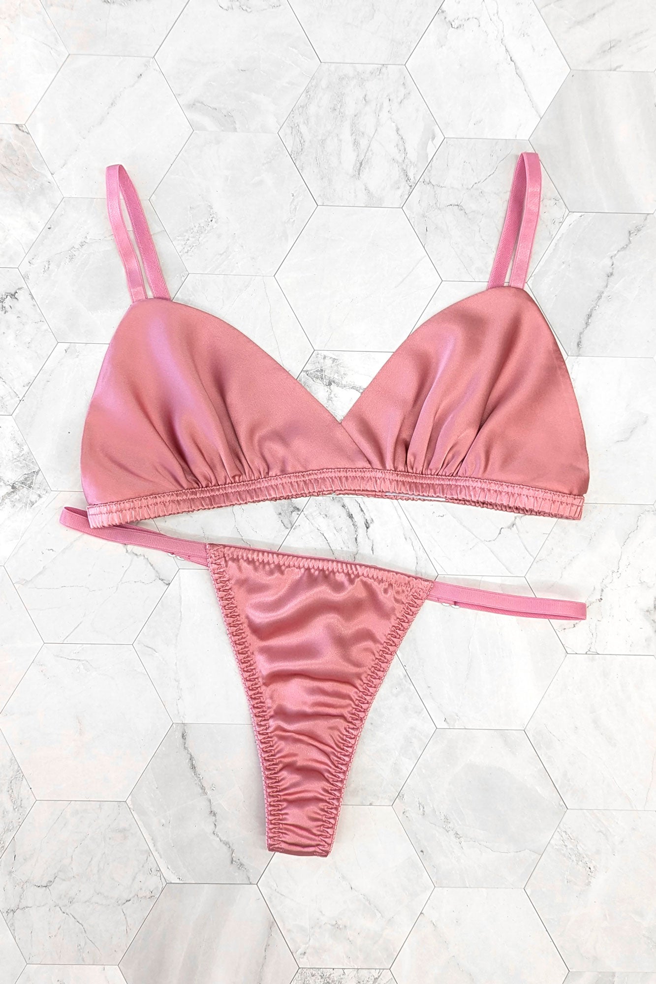 Pink silk bralette and strappy thong panties in a retro inspired cut