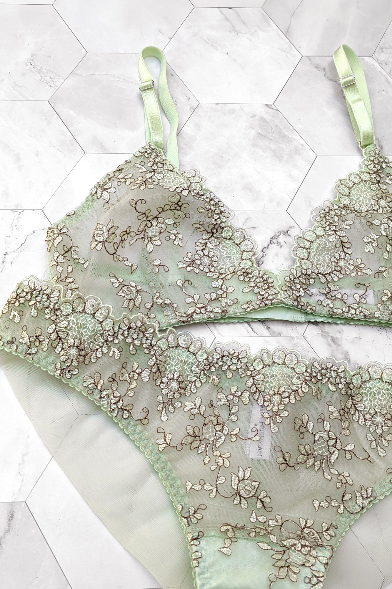 Embroidered green lingerie set with a mesh bralette and panties