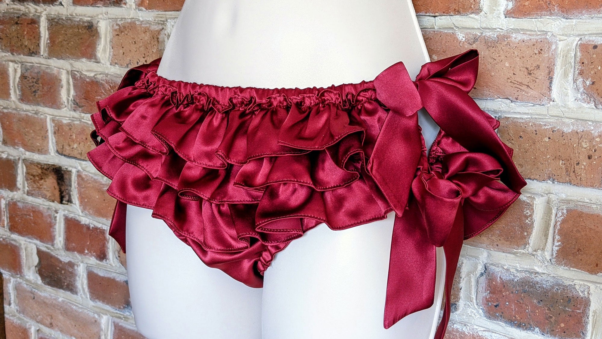 bespoke red ruffle panties in 100% pure silk satin fabric with bow ties on the sides