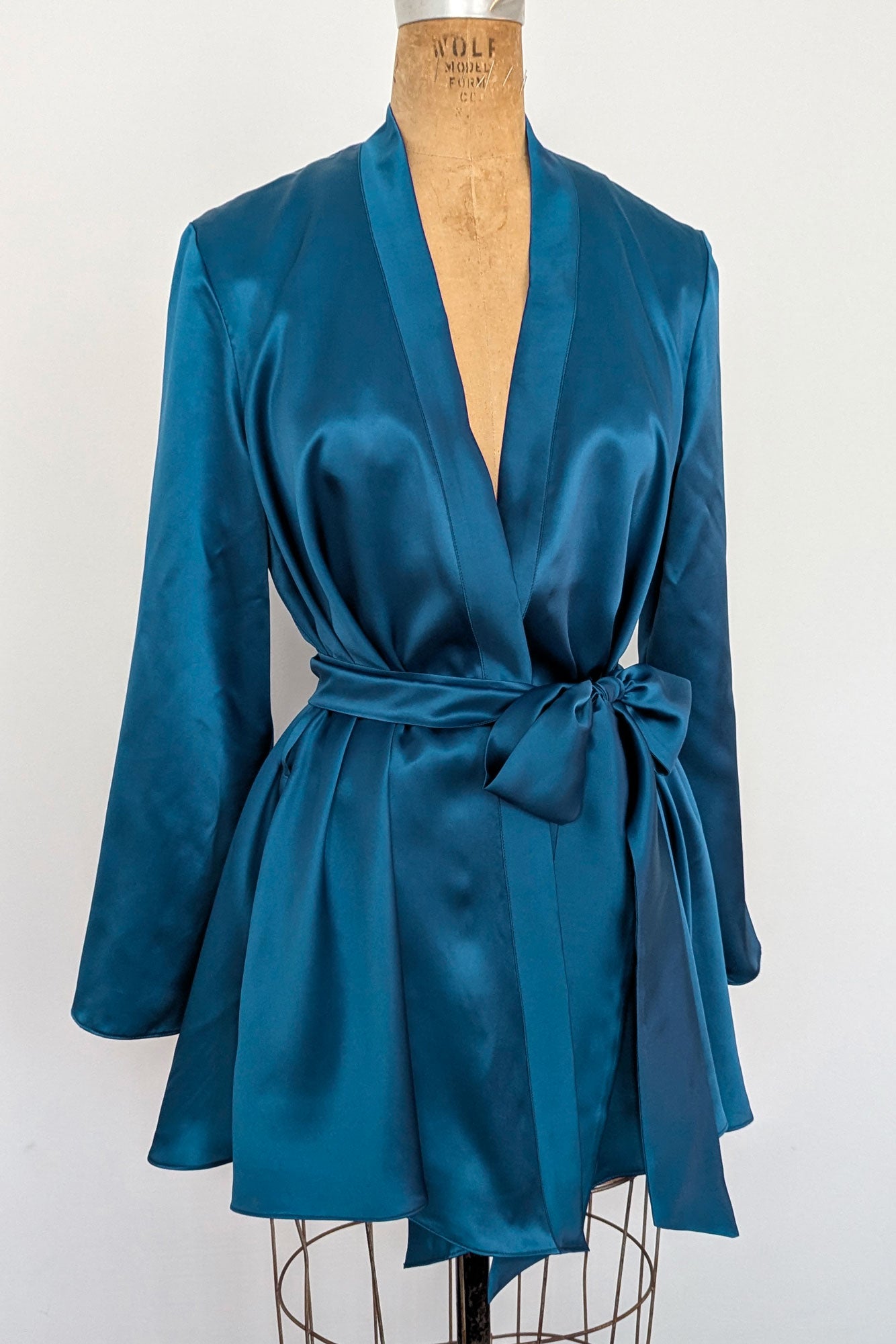 100% pure silk robe with a wide sash belt and long sleeves