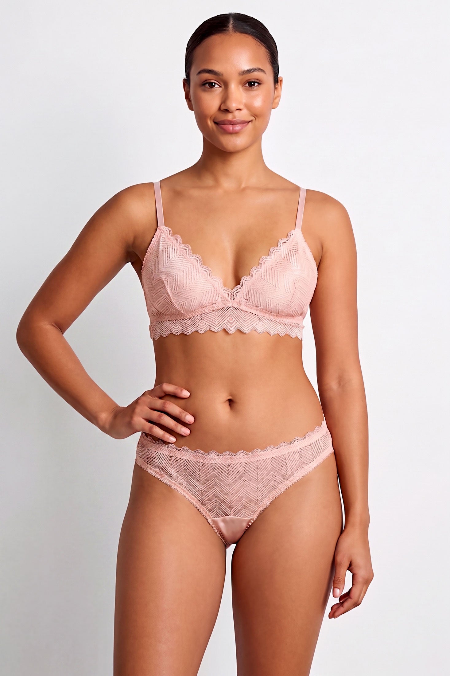 Pink lace bra and underwear set by luxury lingerie brand Angela Friedman