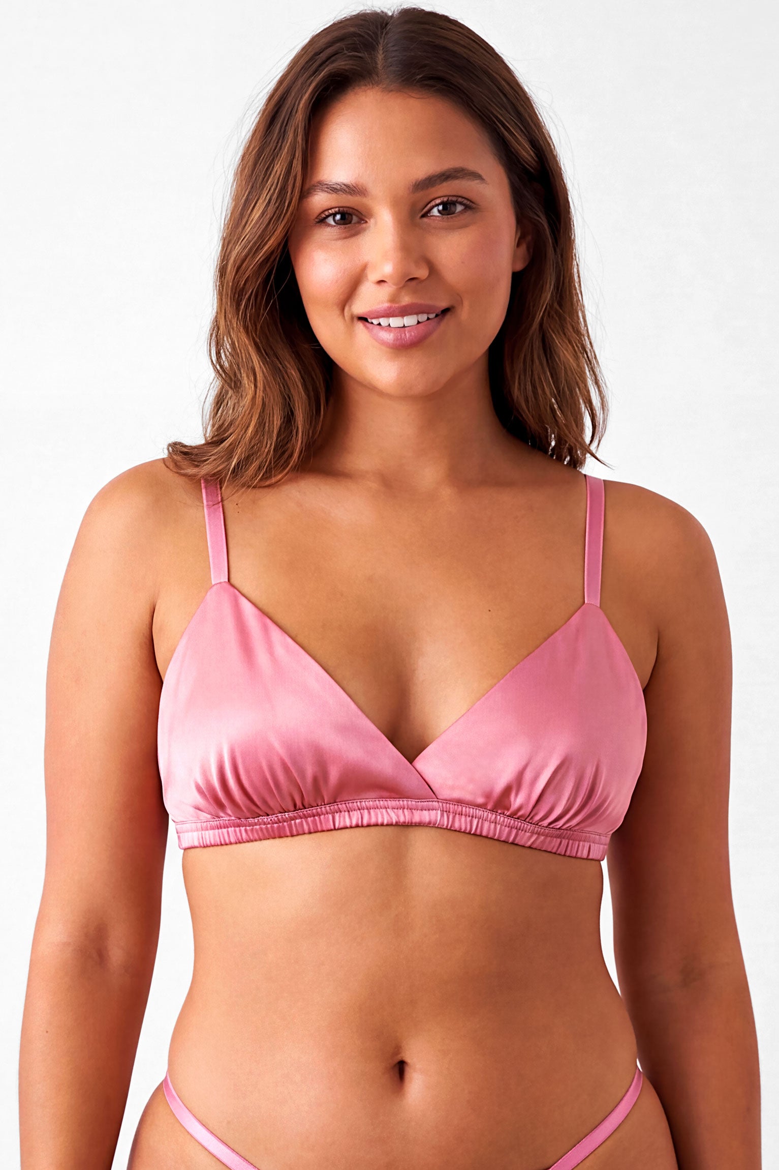 Luxury designer bra in pink silk satin with a ruched elastic band and matching silk underwear