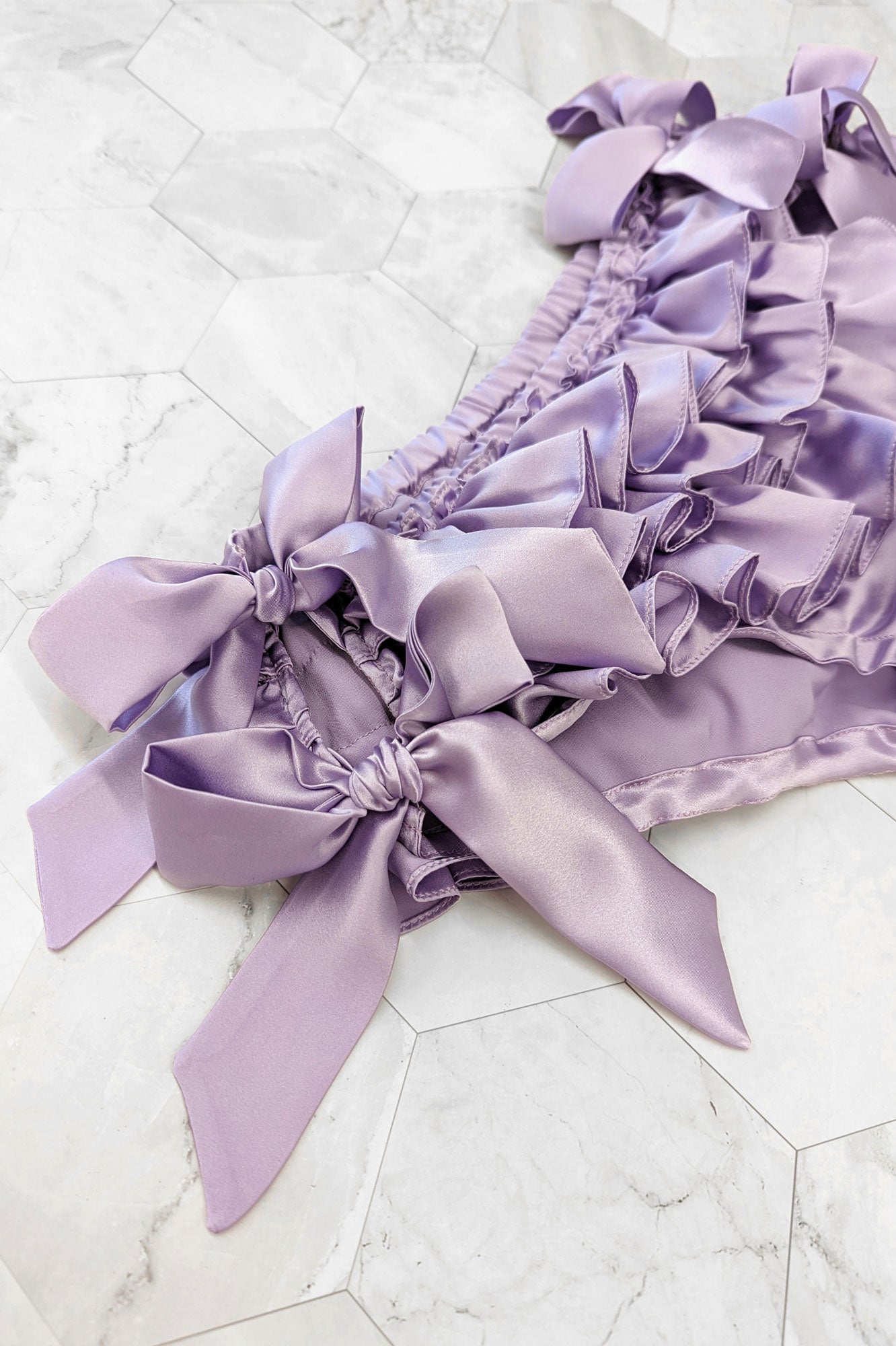 Lilac silk ruffled panties with satin bow side ties