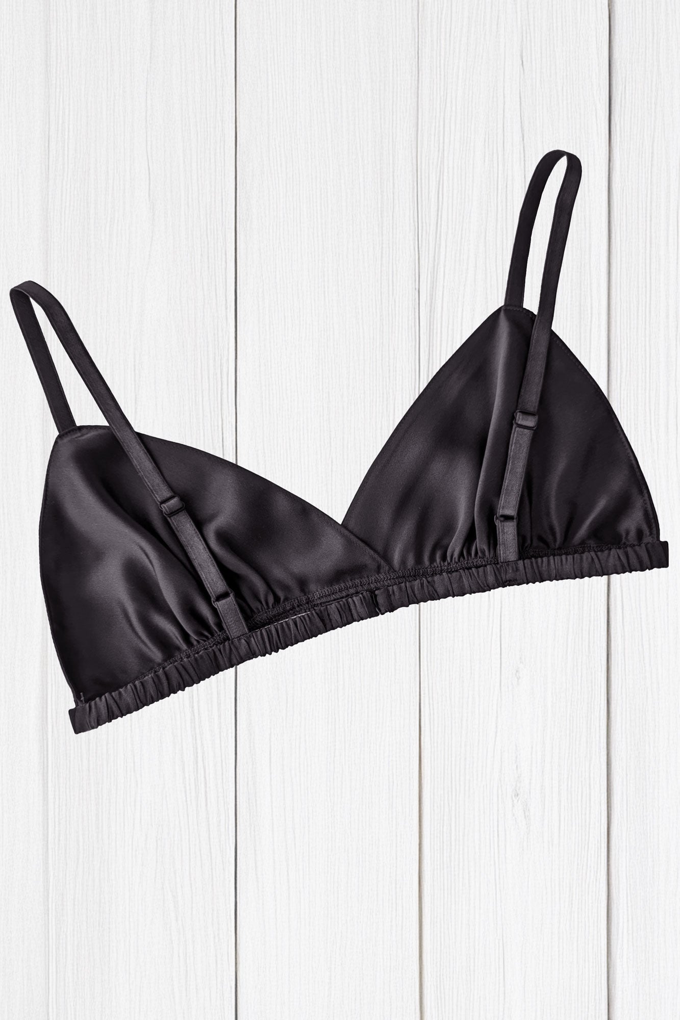 Black silk bralette with a vintage aesthetic triangle cut for sensitive skin