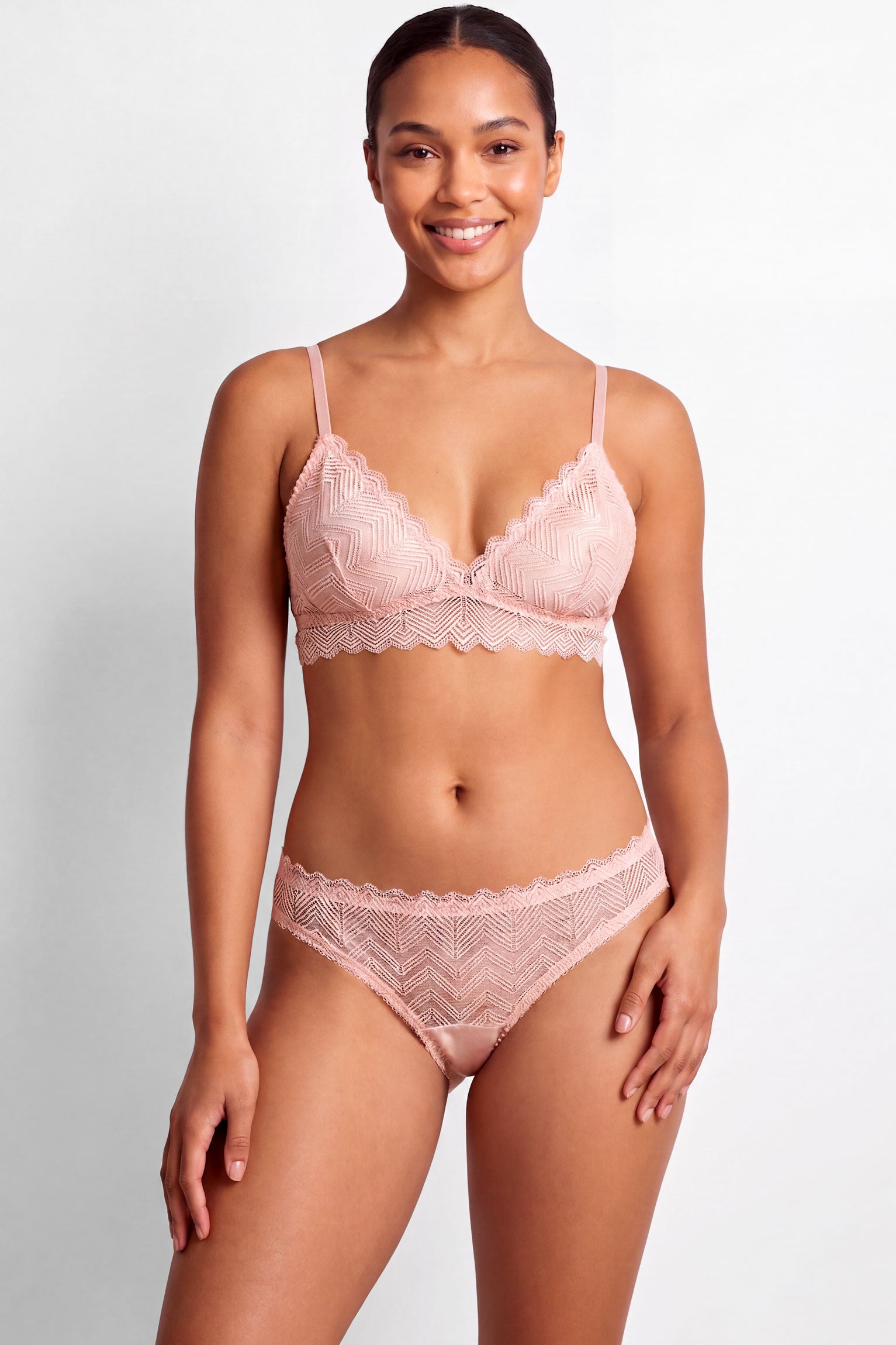 Pink lace bra and underwear set by luxury lingerie brand Angela Friedman