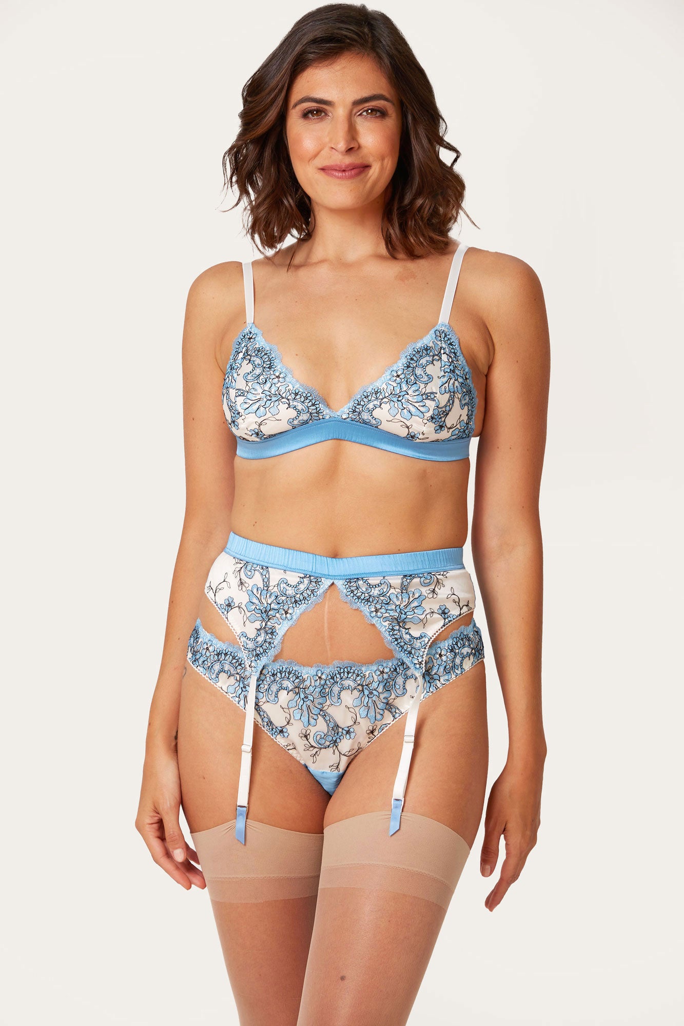 Blue luxury bralette in silk and lace with matching lingerie and stockings