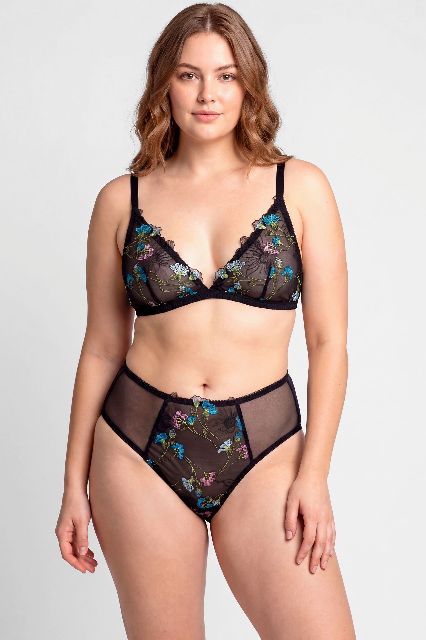 Black mesh lingerie set with floral embroidery overlays and silk linings