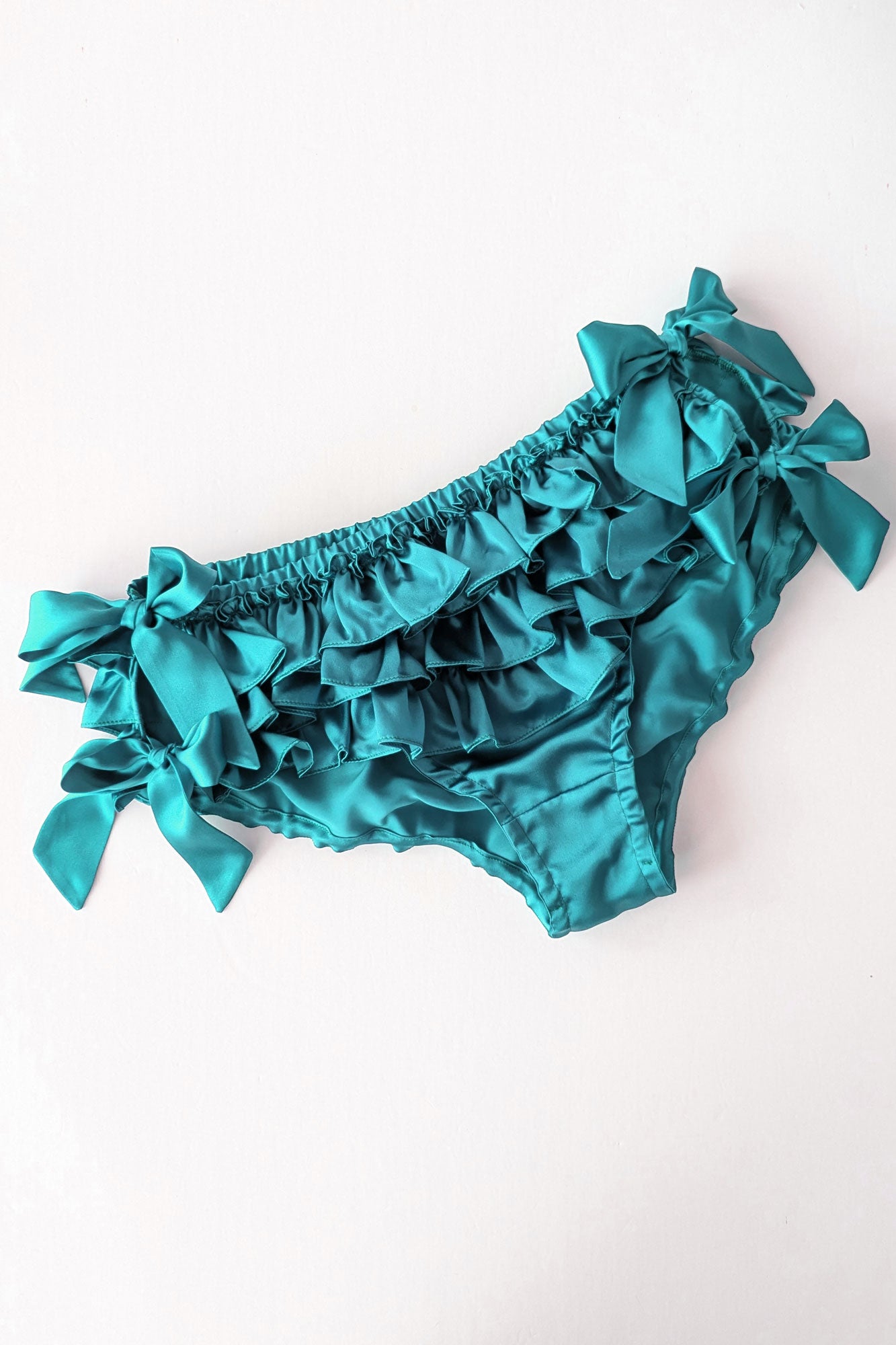Silk ruffle panty with blue side tie bows and 3 ruffles
