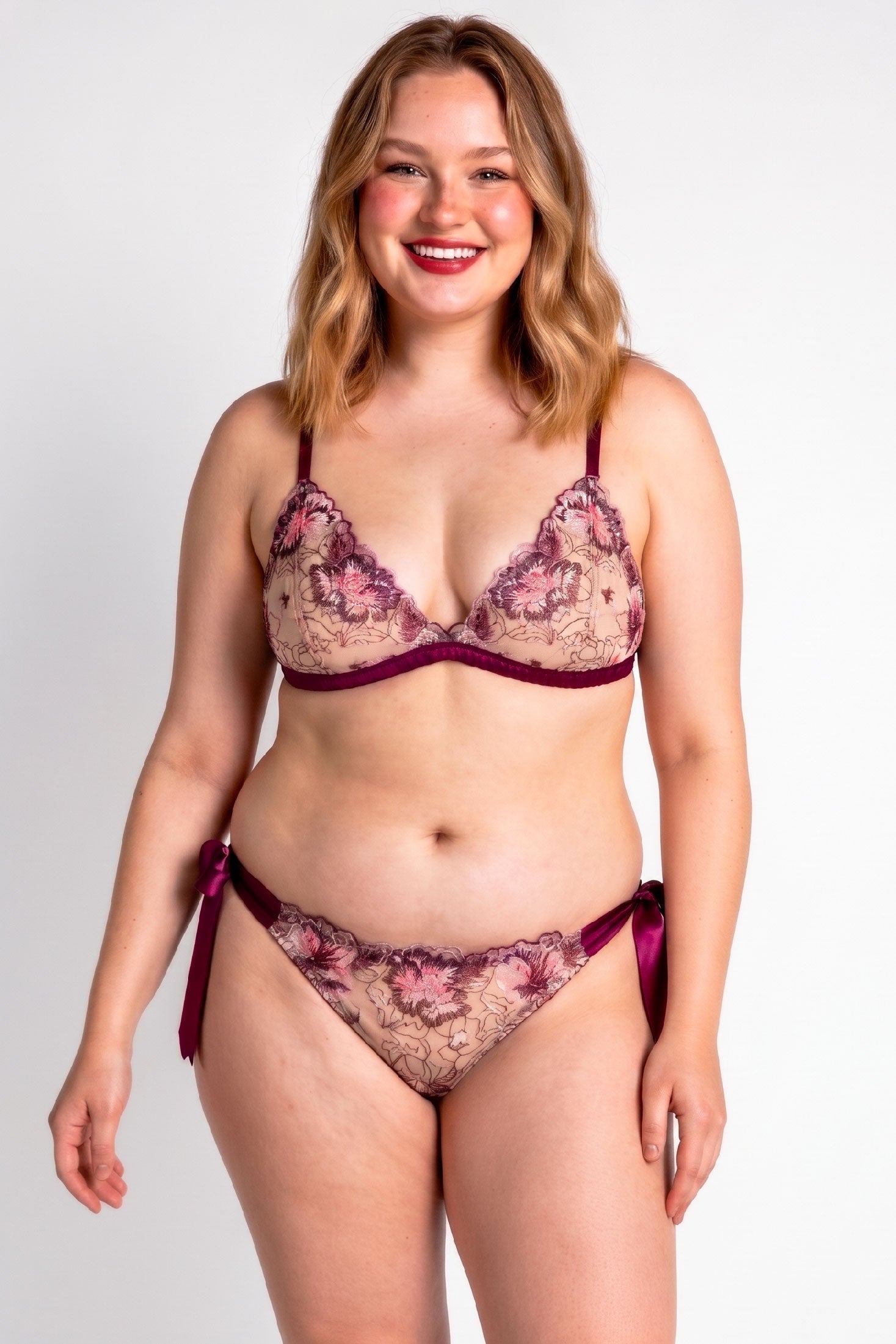 Luxury lingerie set in wine red silk with floral embroidered bra cups and knickers