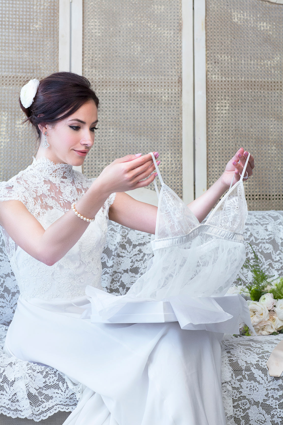 Designer wedding dress by Katherine Bignon in white French lace with silk linings