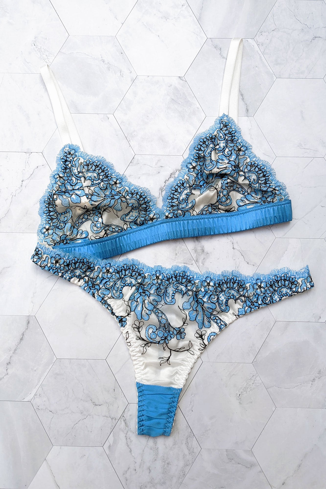 Embroidered designer lingerie set in blue silk with floral print