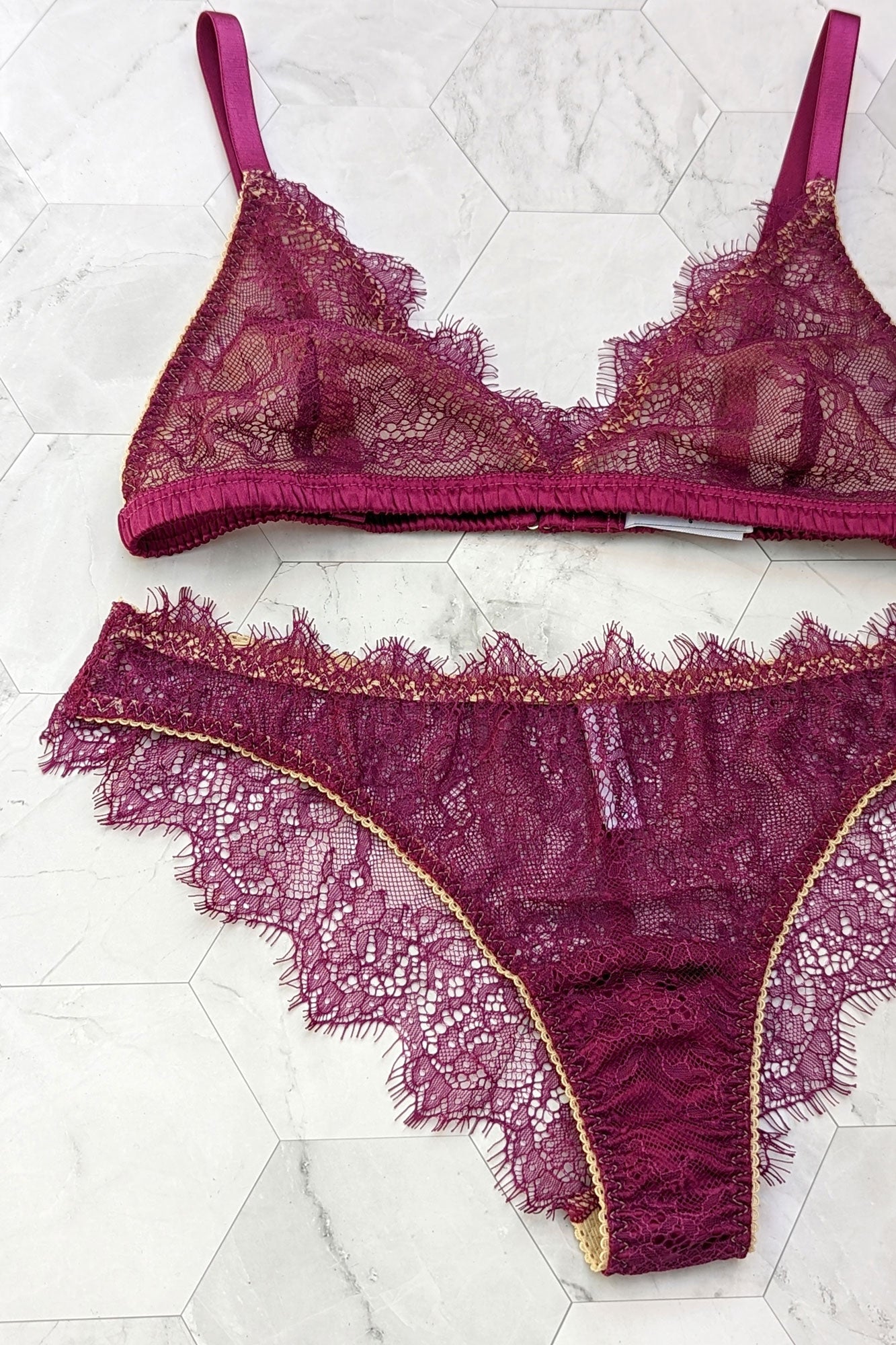 Lace lingerie set for Valentine's Day with magenta pink silk trim