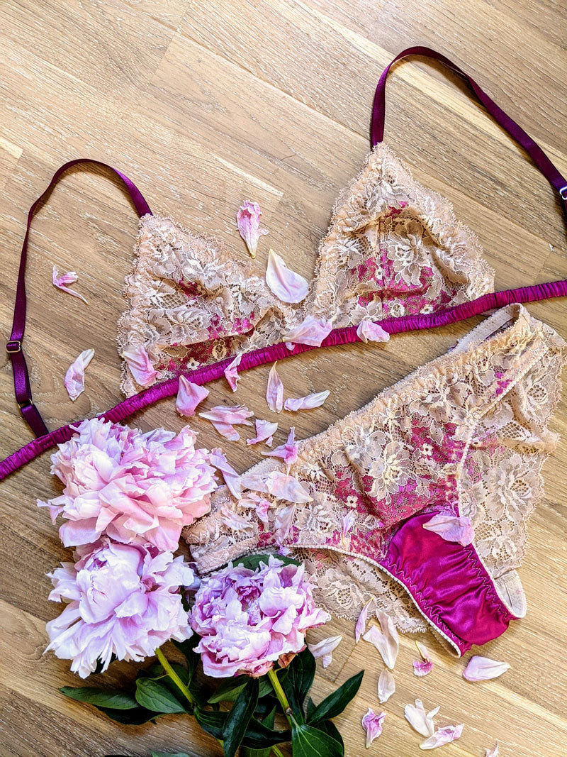 Fuchsia lace knickers with a silk bralette and flowers
