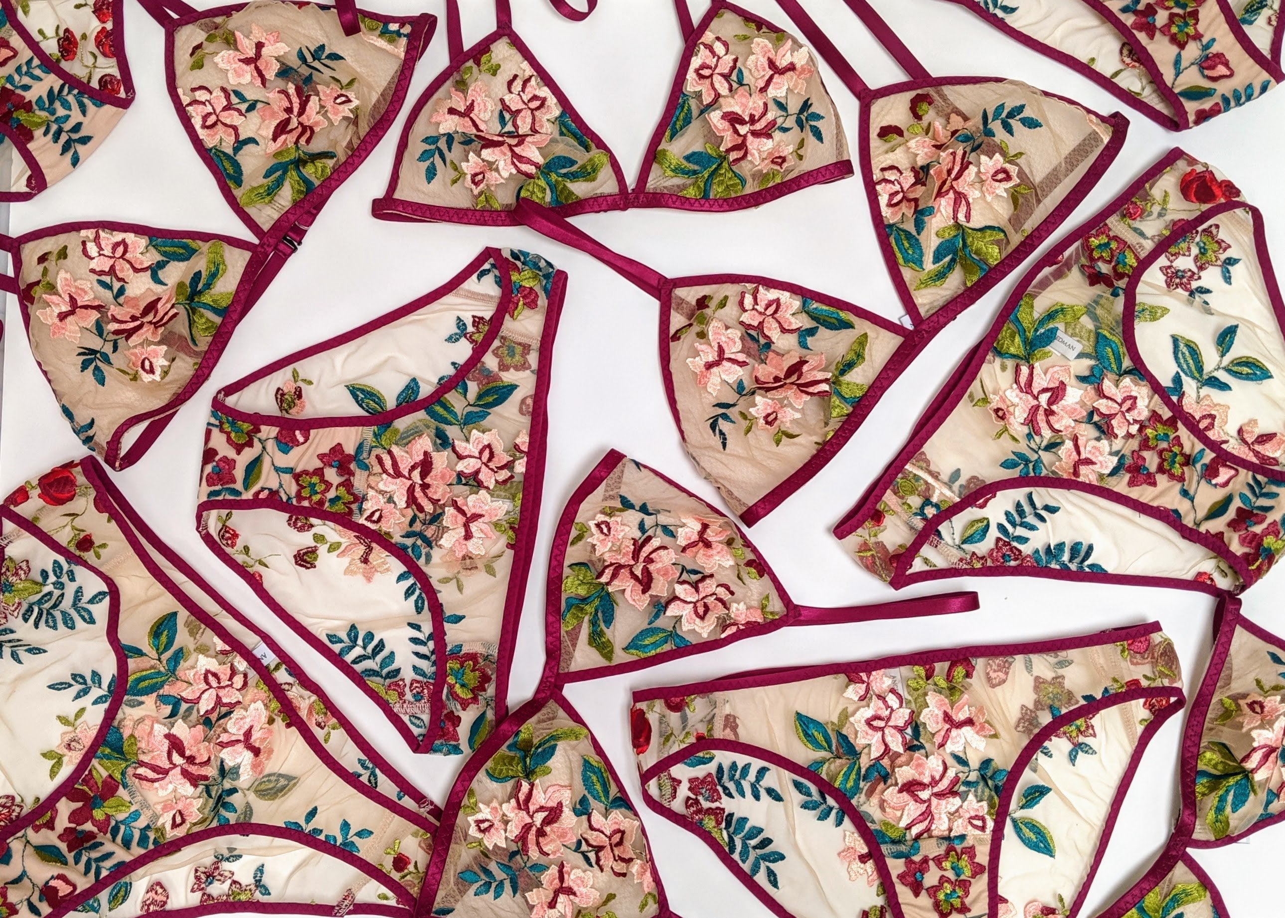 Designer lingerie sets with embroidered floral bras and panties