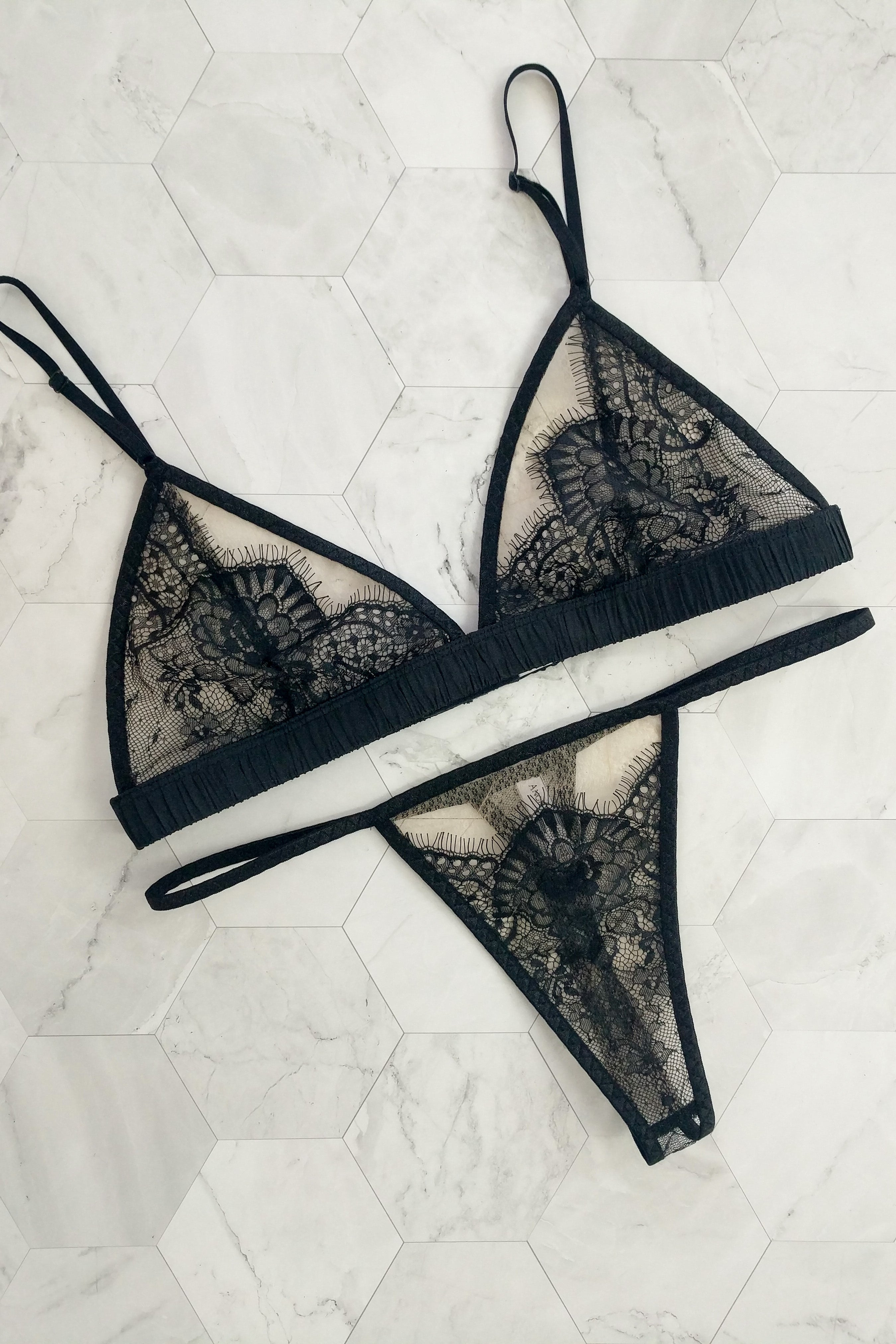 British designer underwear set in black lace with bra and thong