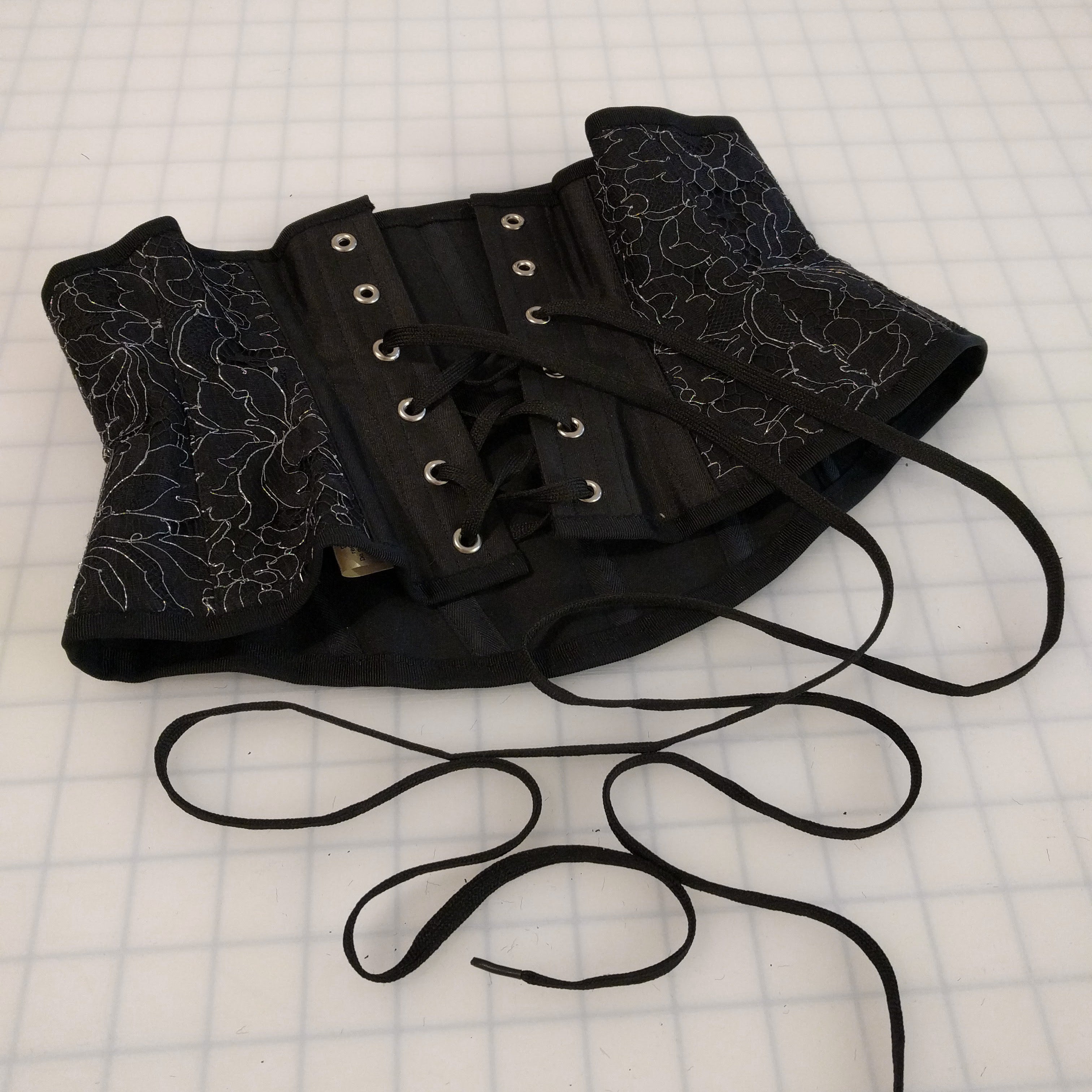 Handmade hourglass waspie corset in black silk and lace