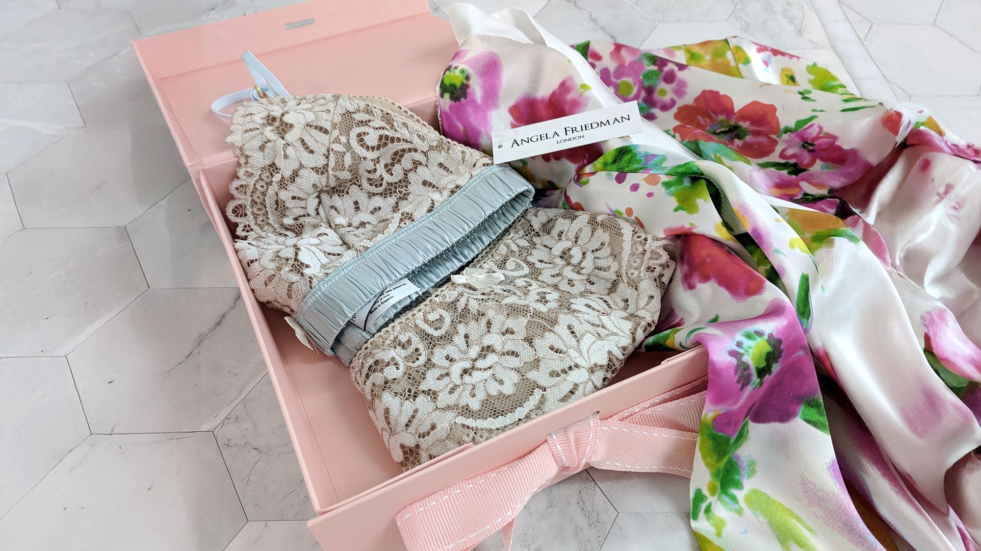 Lingerie gift box with a luxury silk robe and lace bra and underwear set