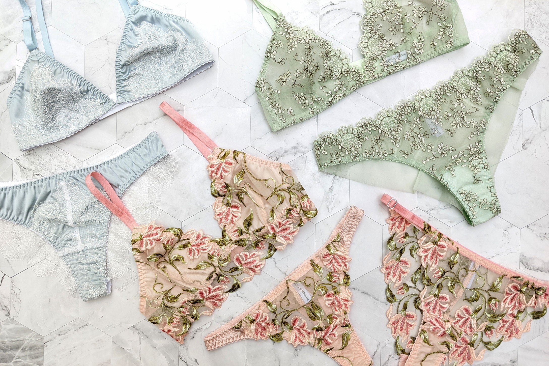 Luxury lingerie sets in blue, pink, and green with embroidery and French lace