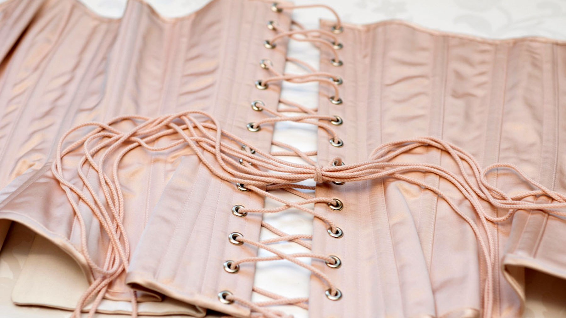Real steel-boned corset in pink silk satin