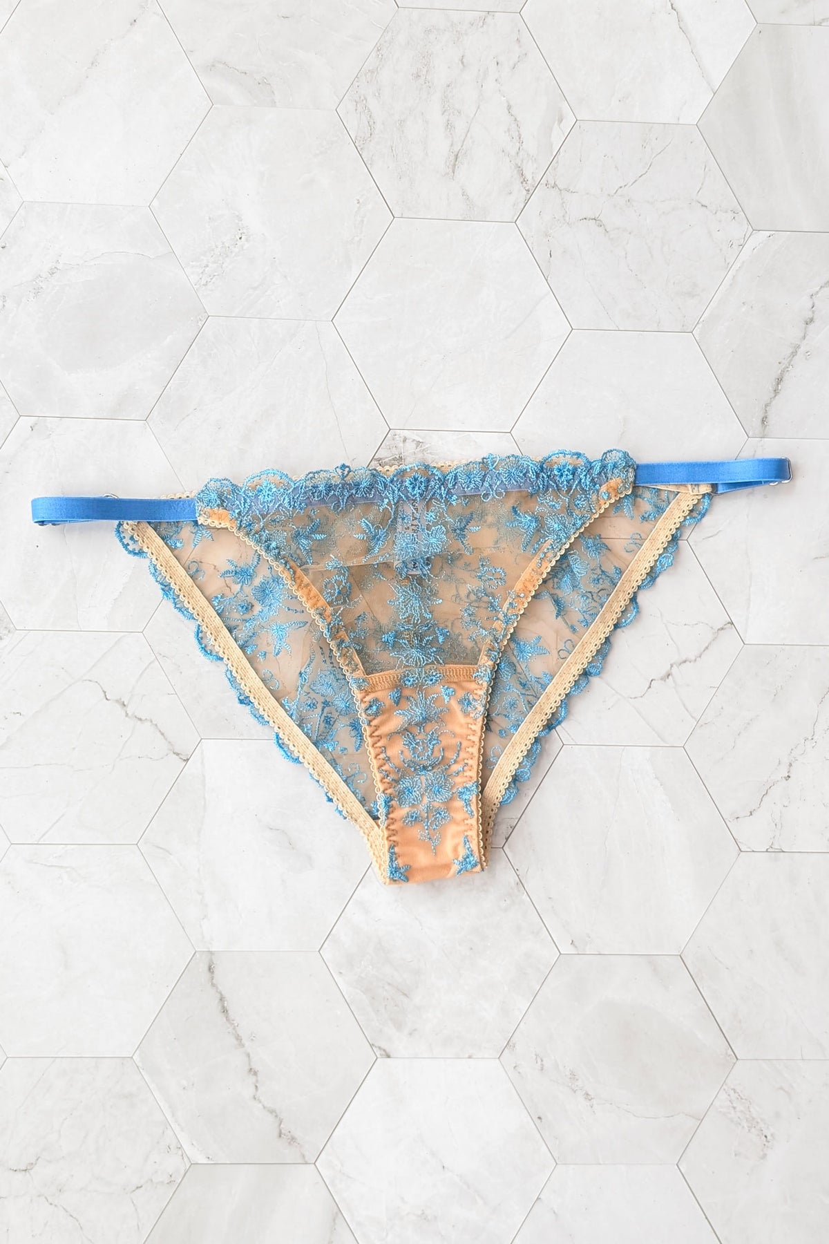 Luxury lace underwear in blue and beige mesh with blue strappy side panels