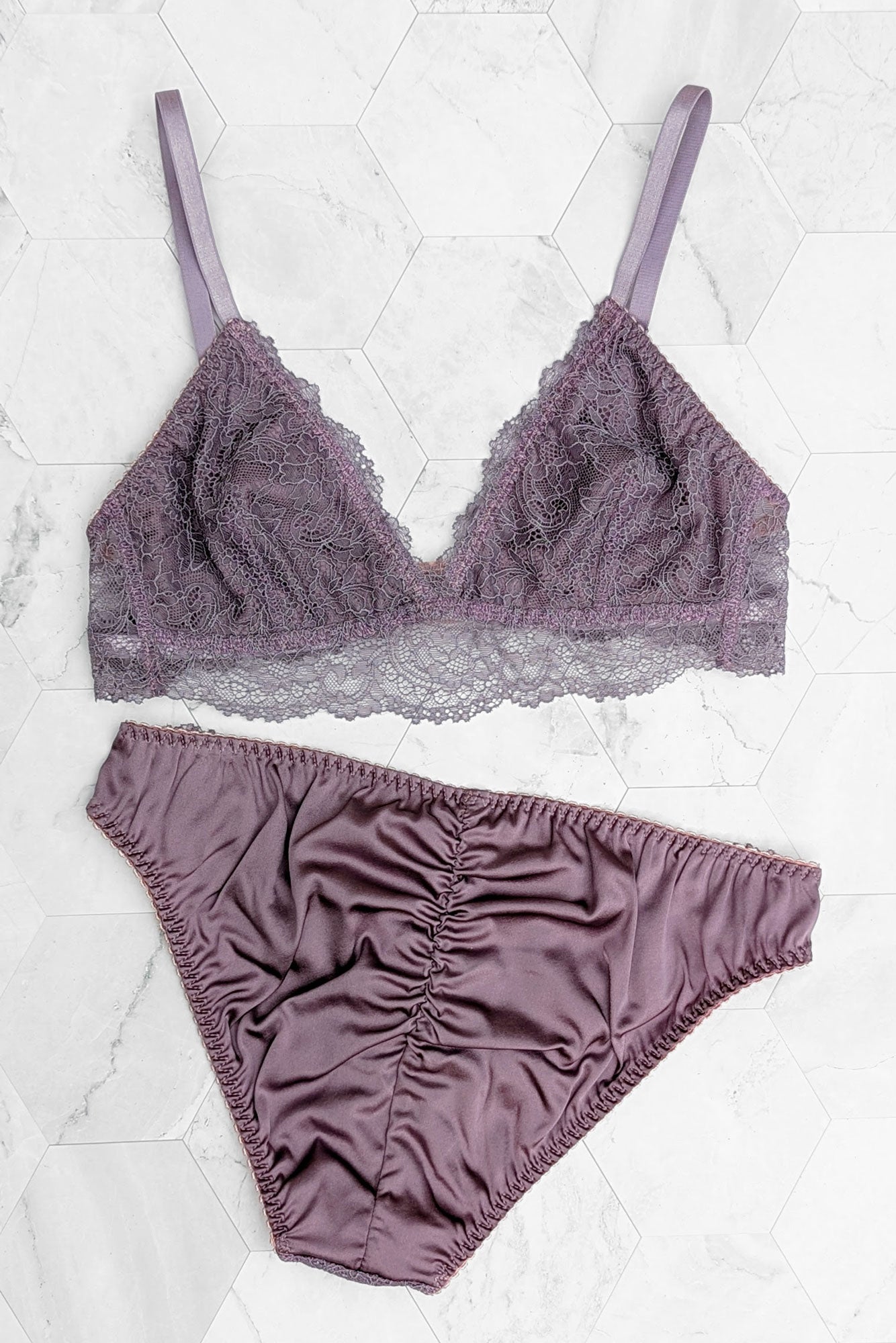 Silk and lace lingerie set including a triangle longline bralette and ruched satin knickers