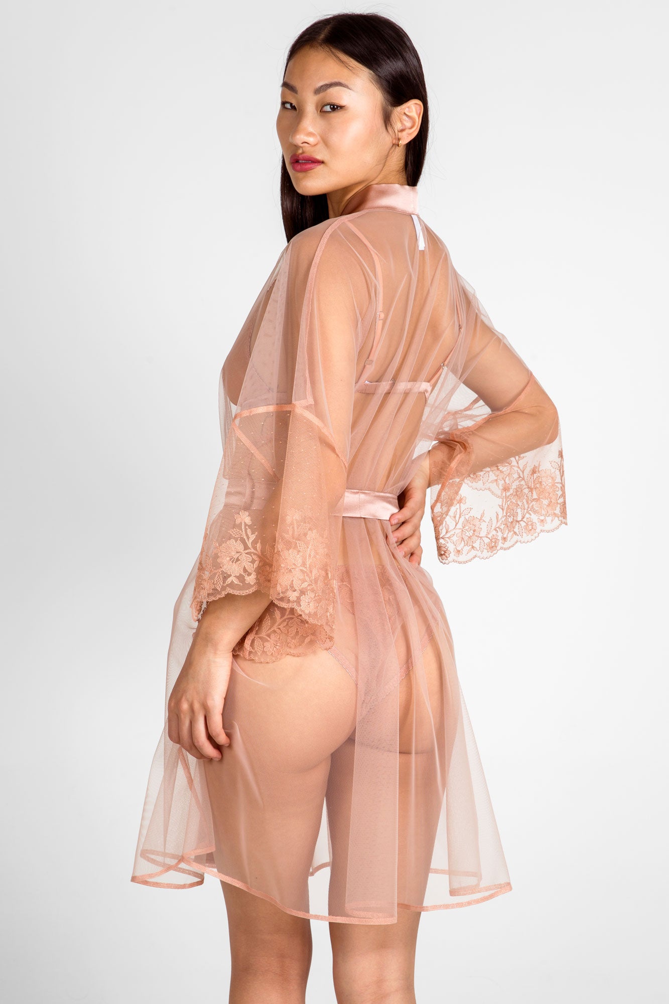 Blush pink luxury robe with wide embroidered flower sleeves and a sheer tulle skirt