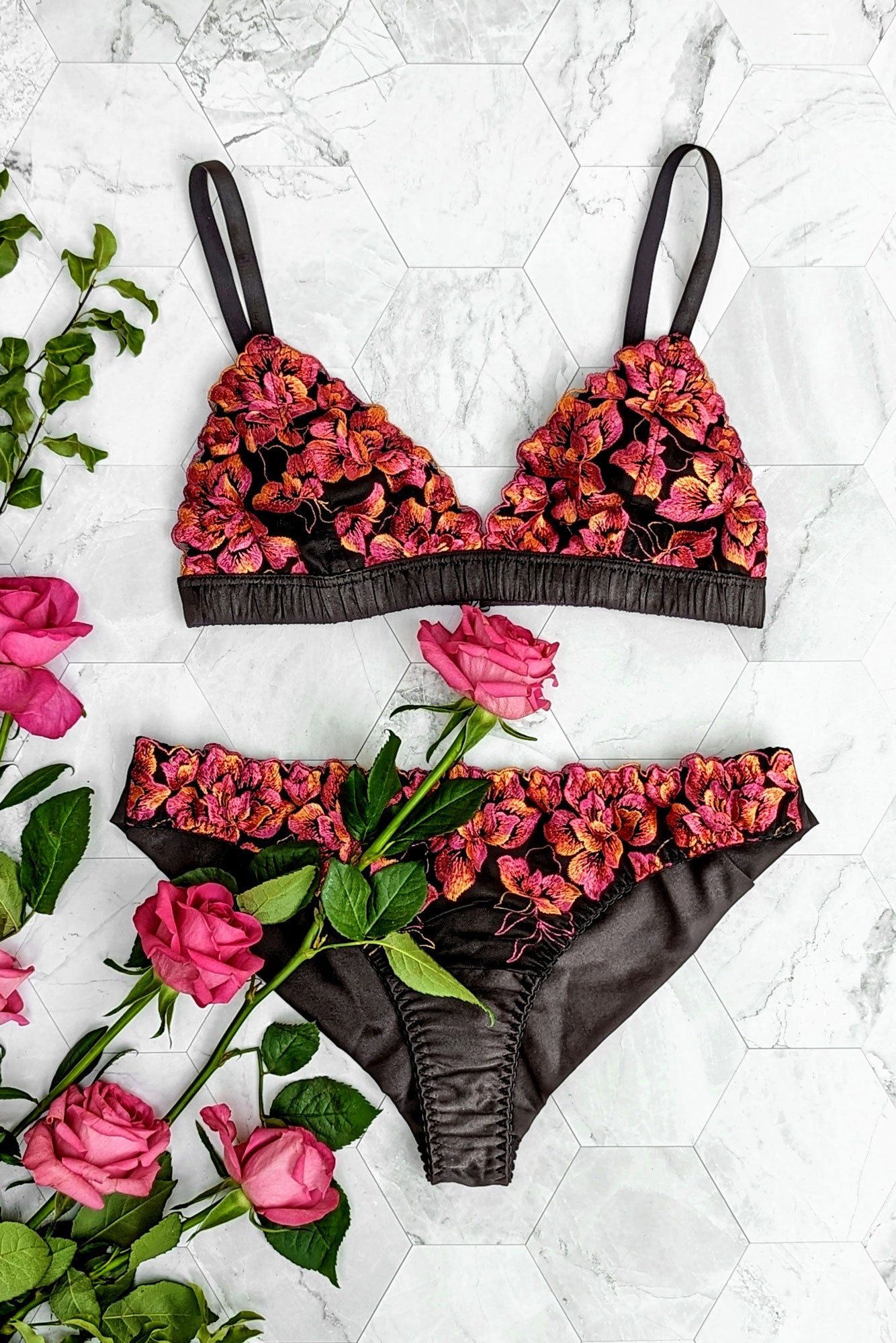 Luxury lingerie set with silk panties and floral pink bralette