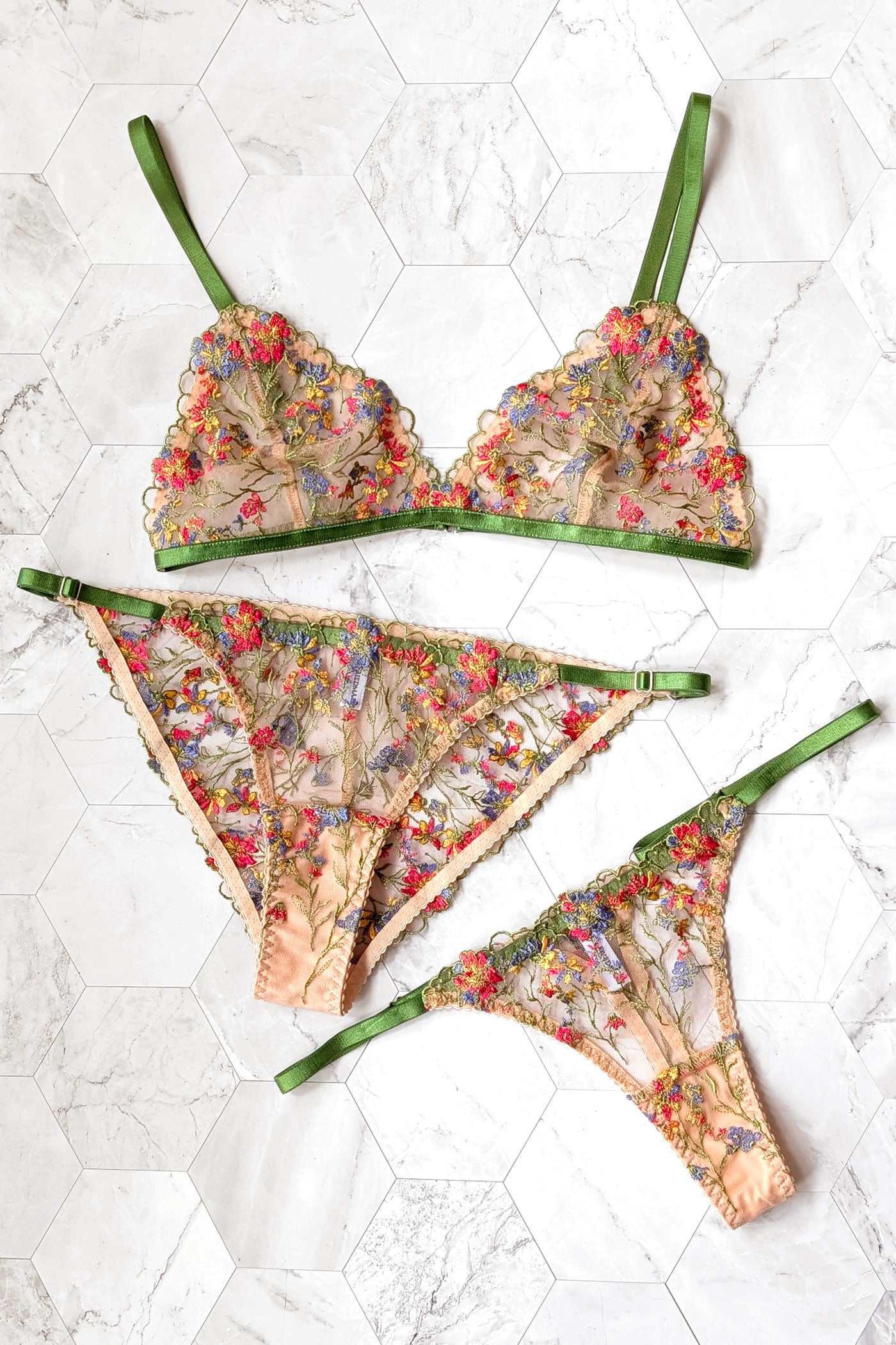 Floral embroidered bralette and knickers with multicolor threads and bright green straps and bra band