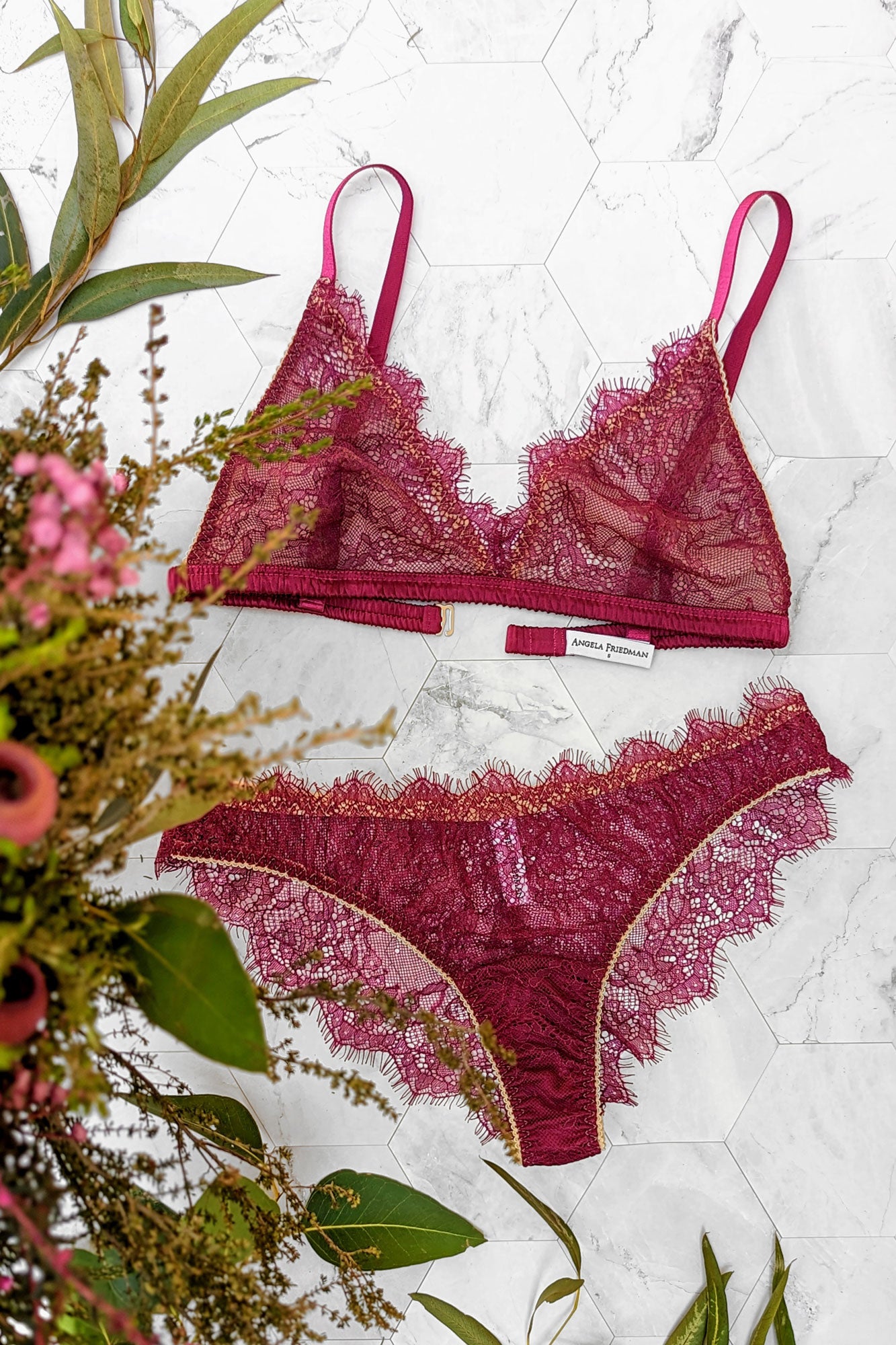 Luxury lace lingerie set with a wirefree bralet and sheer magenta panties