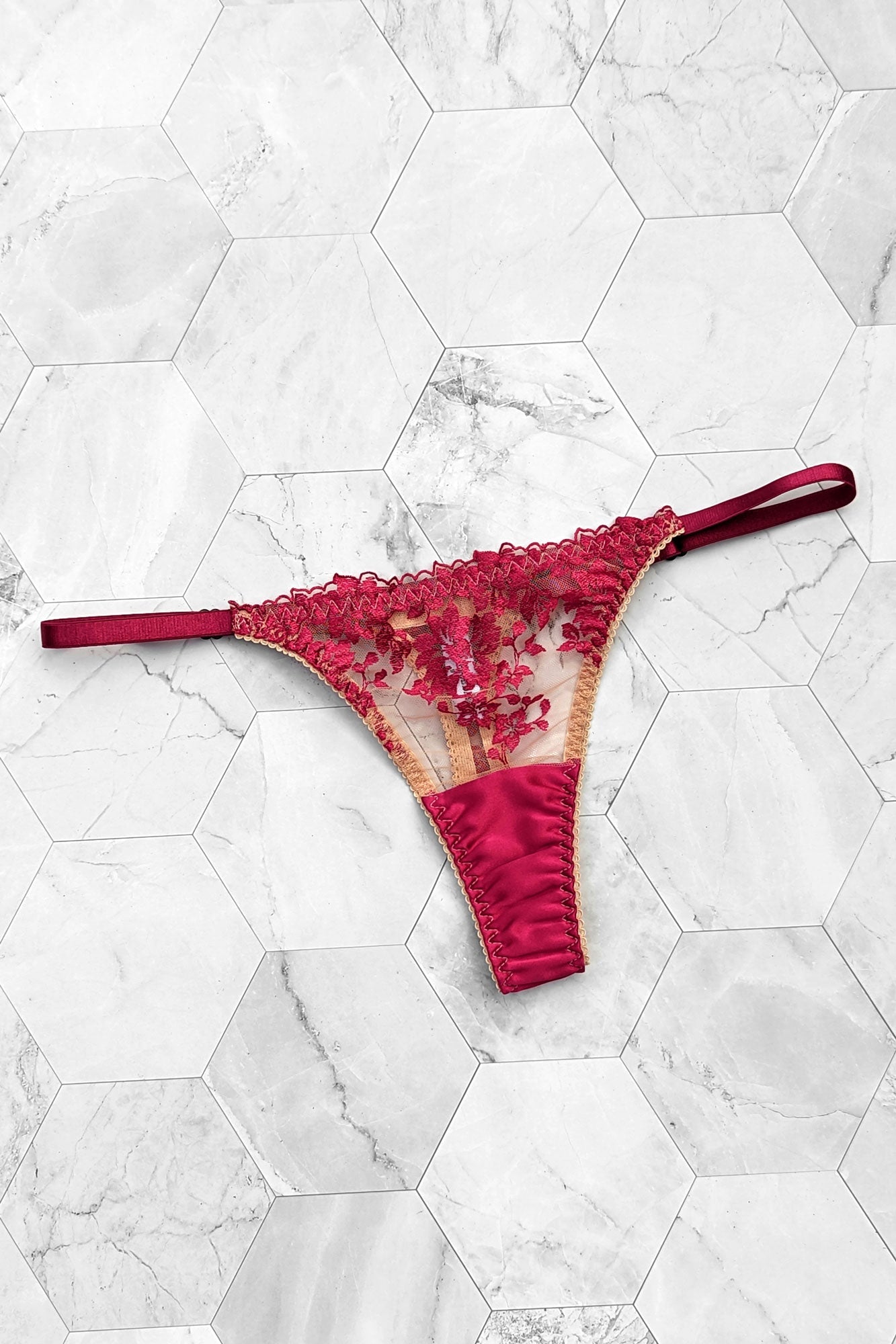 Designer thong panties in red silk with strappy sides