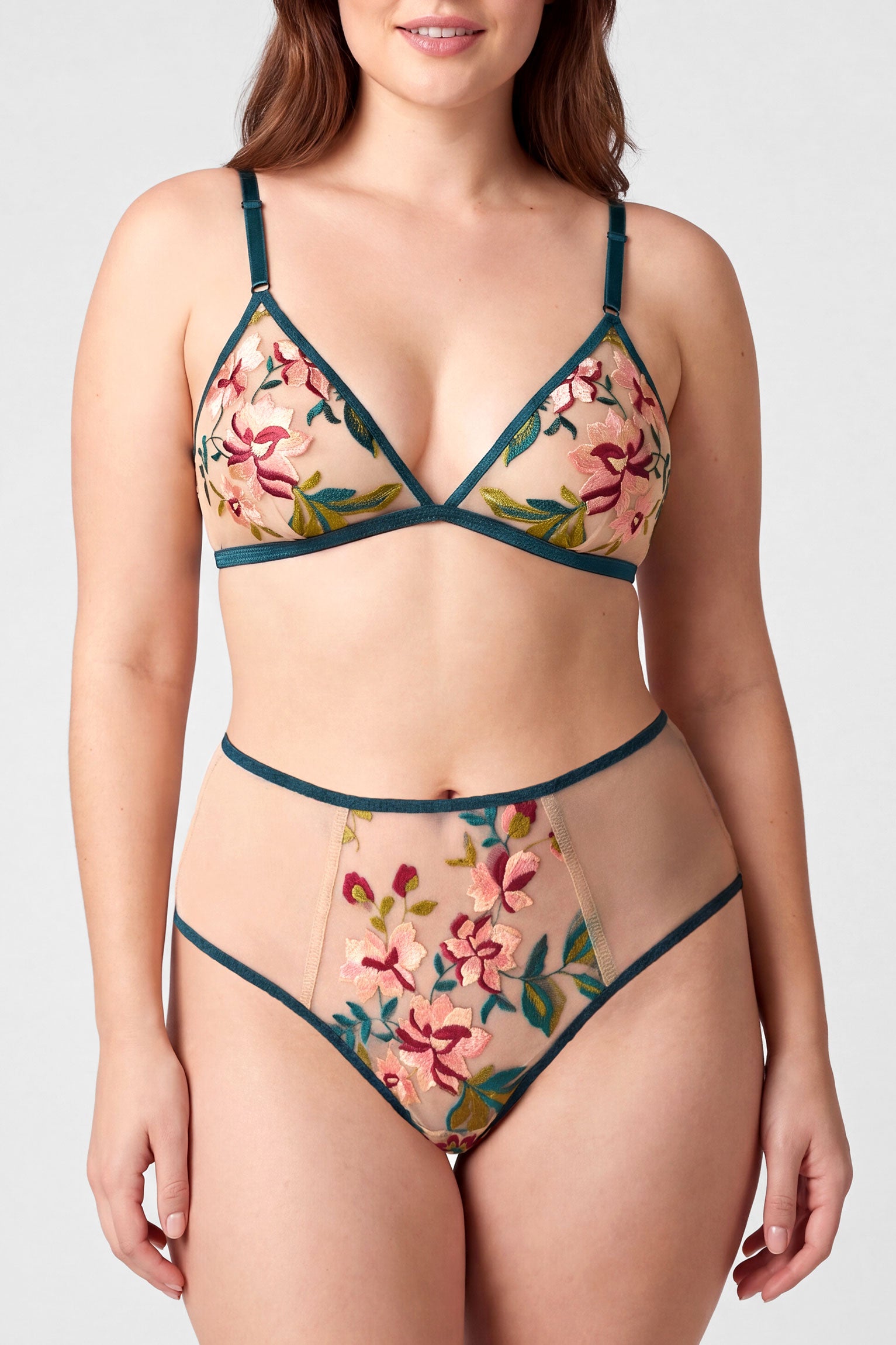 Closeup shot of a flowery lingerie set with a wire-free triangle bralet and hi-rise panties