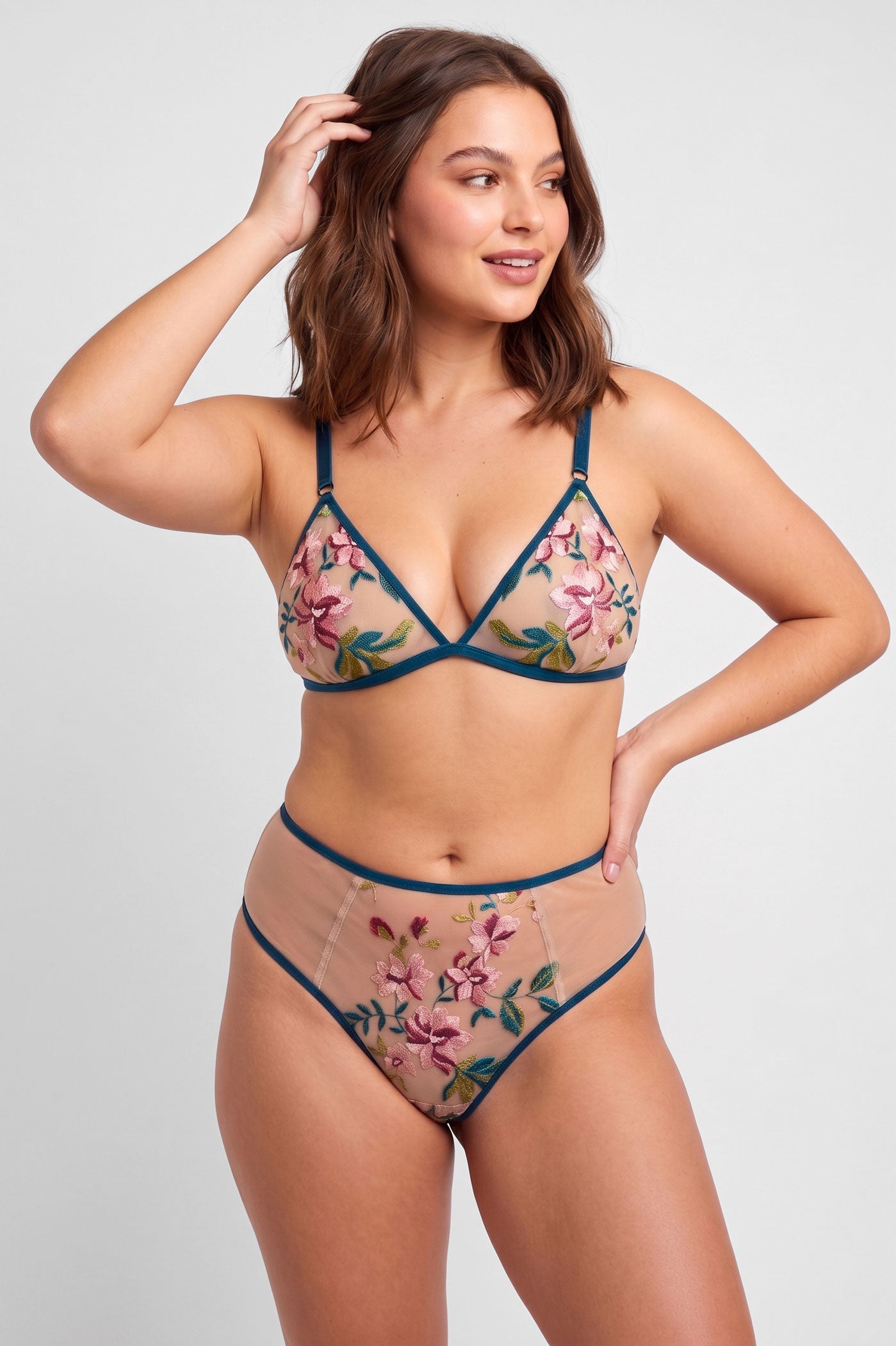 Floral bra and briefs set in size large with embroidered pink and red flower overlays