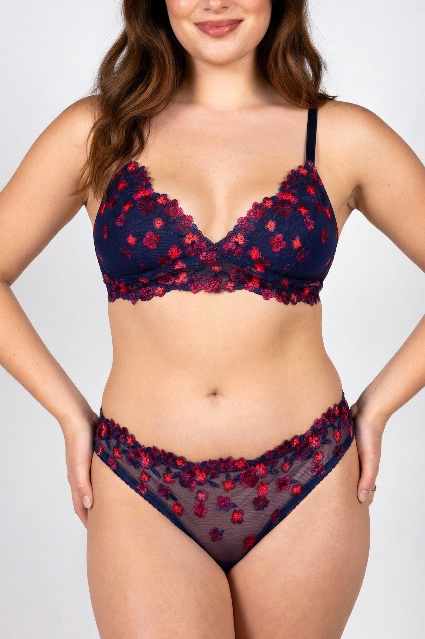 Luxury lingerie set with embroidered flowers and blacklight reactive threads