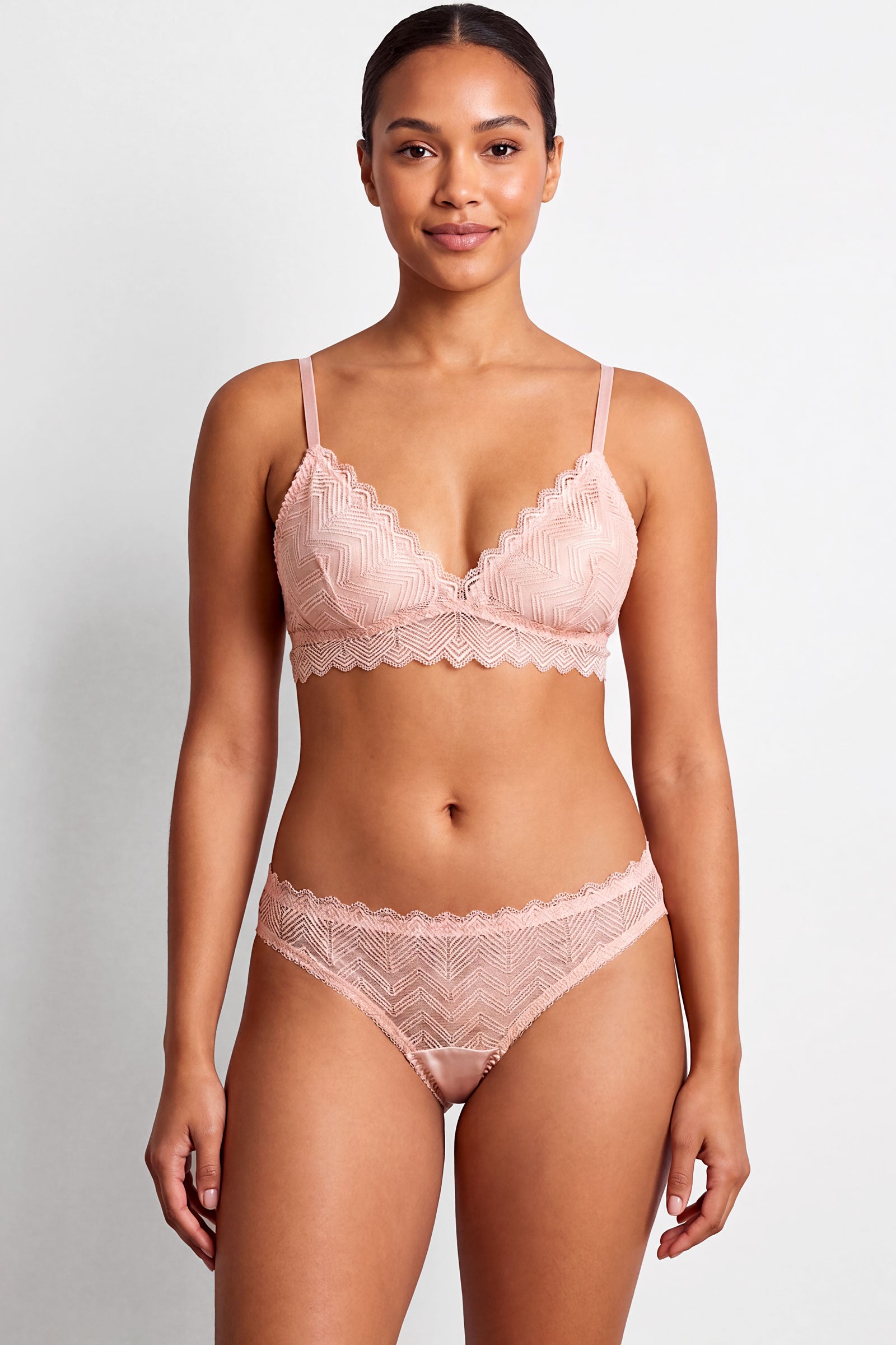 Pink lace bra and underwear set by luxury lingerie brand Angela Friedman