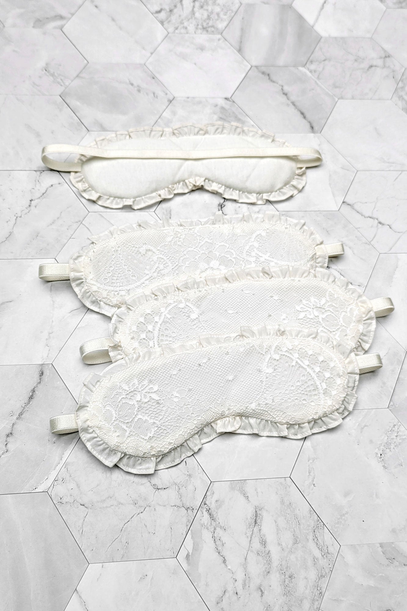 Silk sleep masks in white lace for brides and wedding gifts