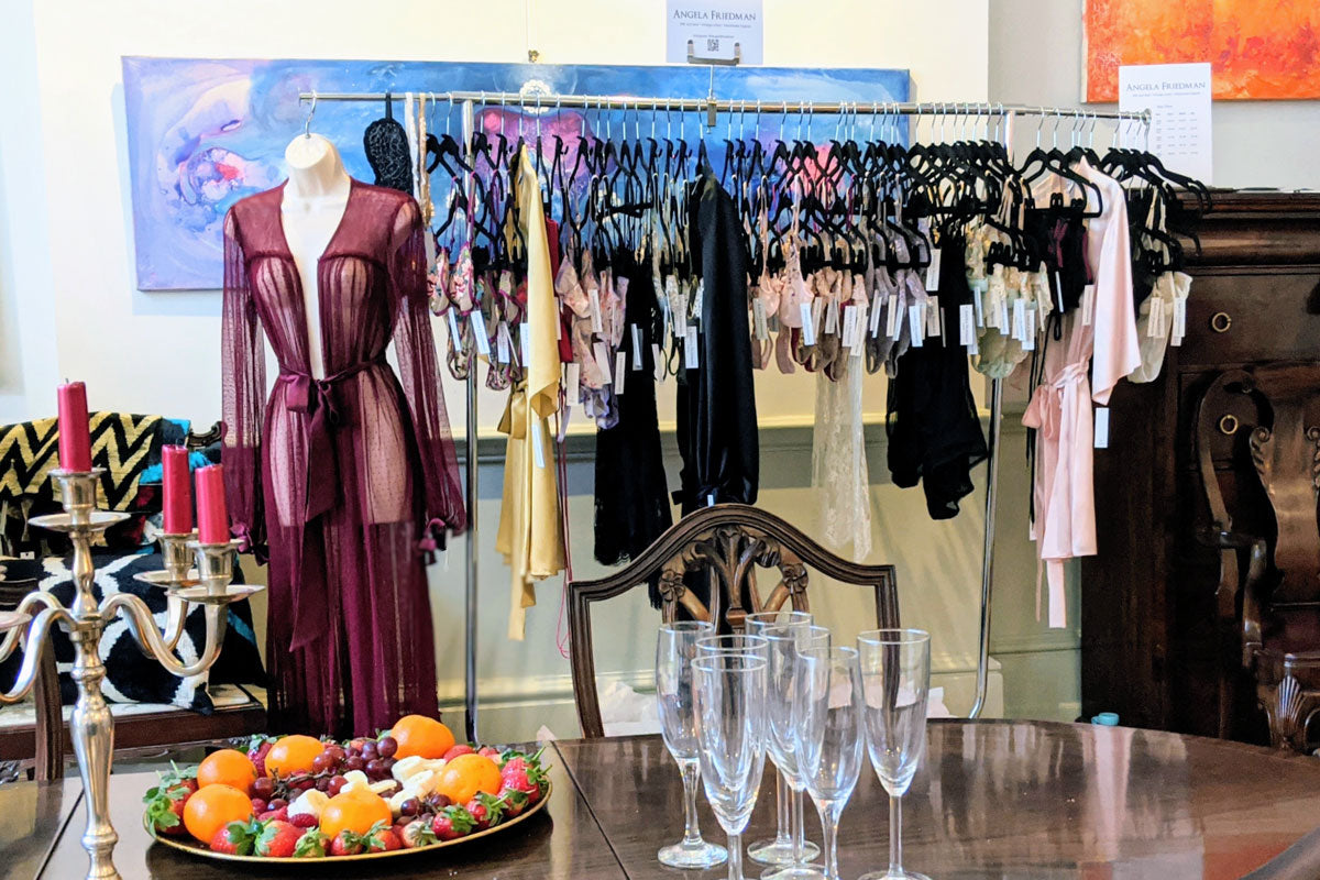 Angela Friedman designs hanging at a pop-up shop in Mayfair London