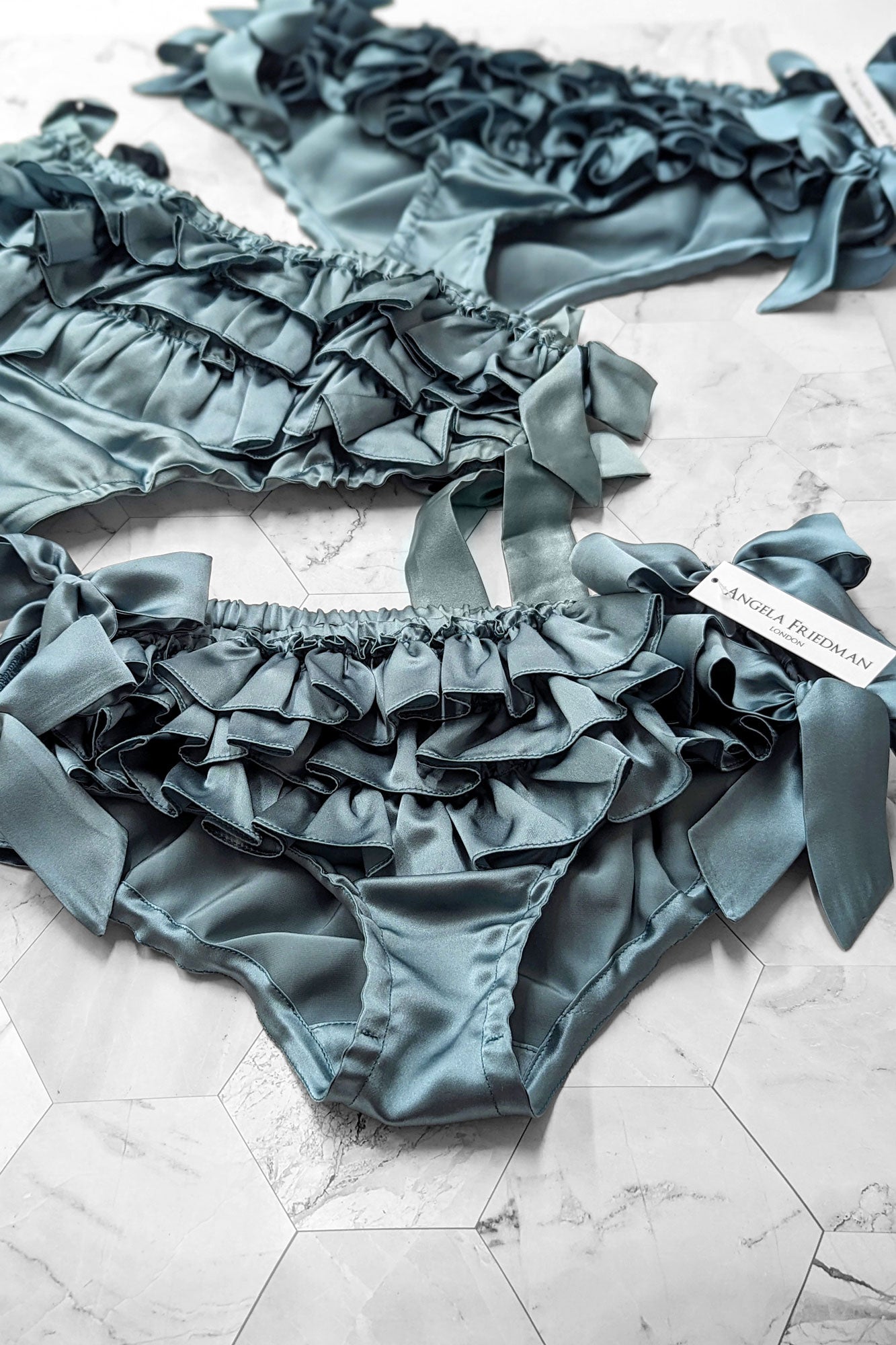 100% silk satin ruffled panties in teal blue with bows and side ties