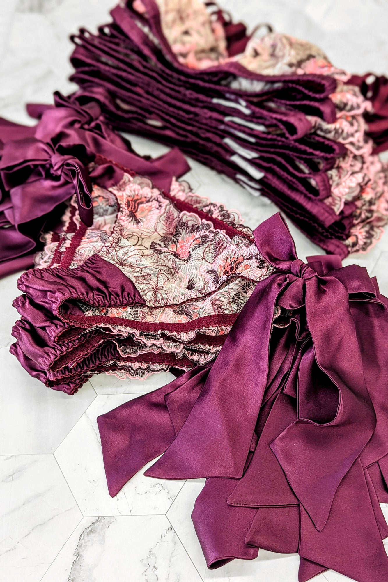Silk knickers with burlesque style side tie bows and flower embroidery